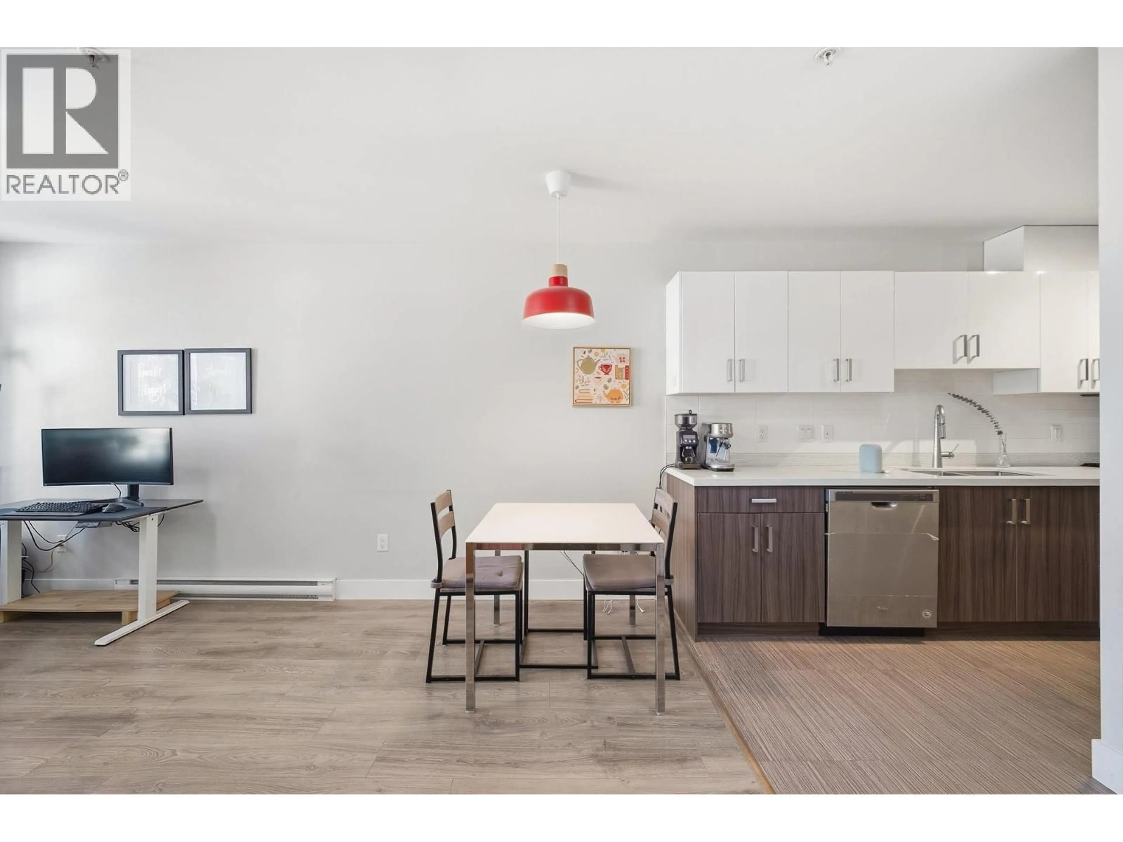 Open concept kitchen, wood/laminate floor for 302 - 3939 KNIGHT STREET, Vancouver British Columbia V5N3L8