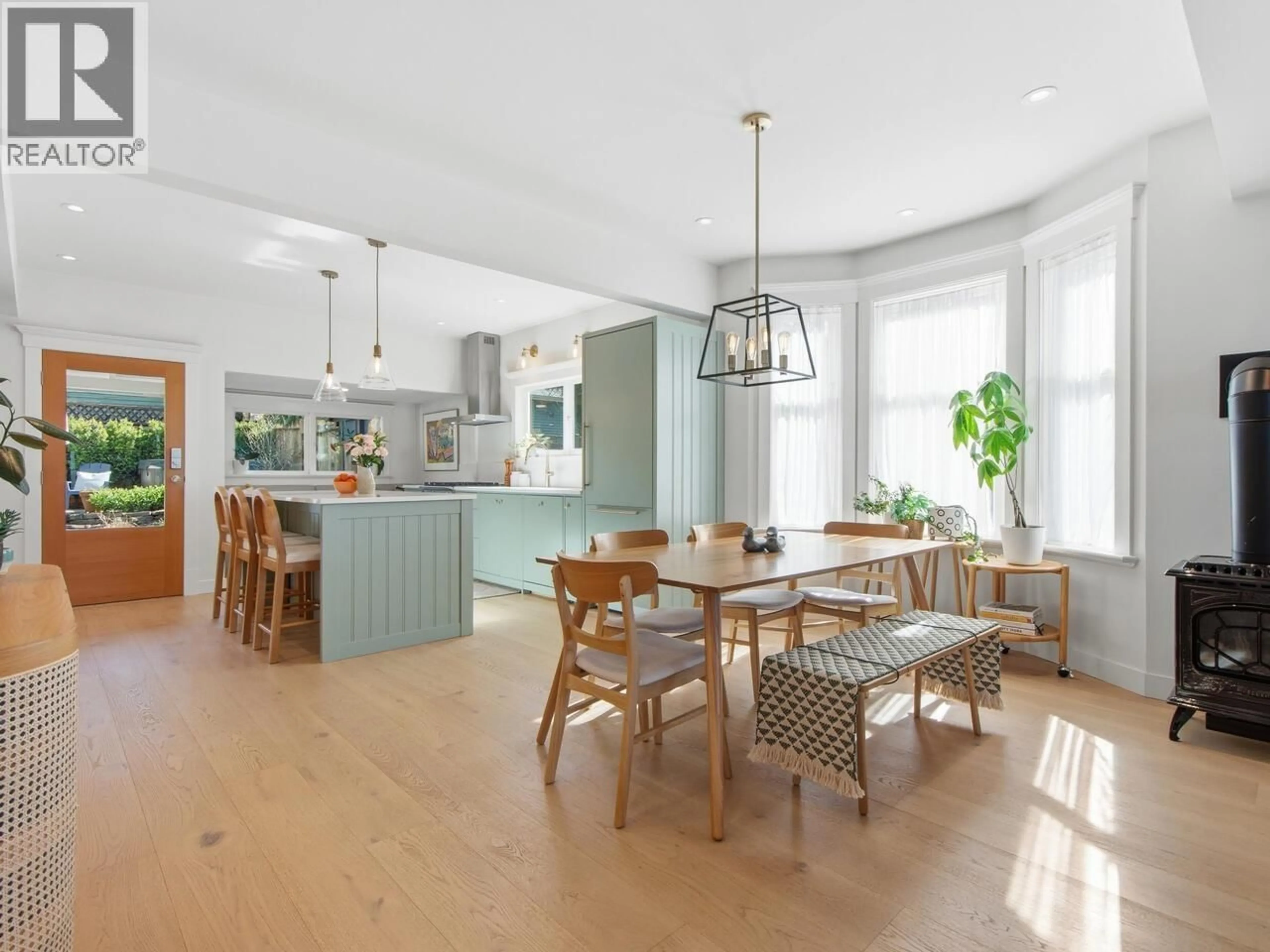 Open concept kitchen, wood/laminate floor for 2224 VICTORIA DRIVE, Vancouver British Columbia V5N4K6