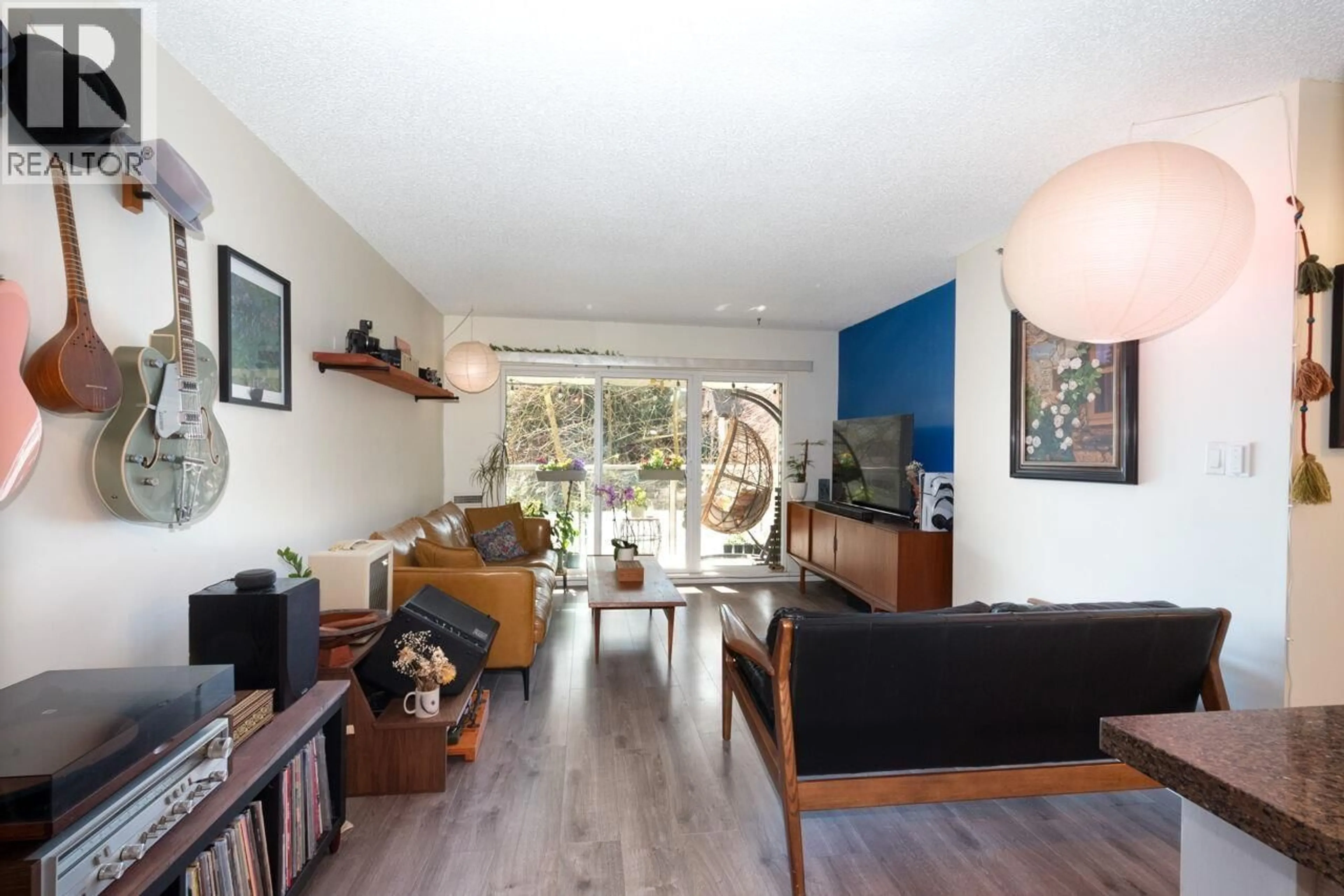Living room with furniture, wood/laminate floor for 307 - 825 7TH AVENUE, Vancouver British Columbia V5T1P4