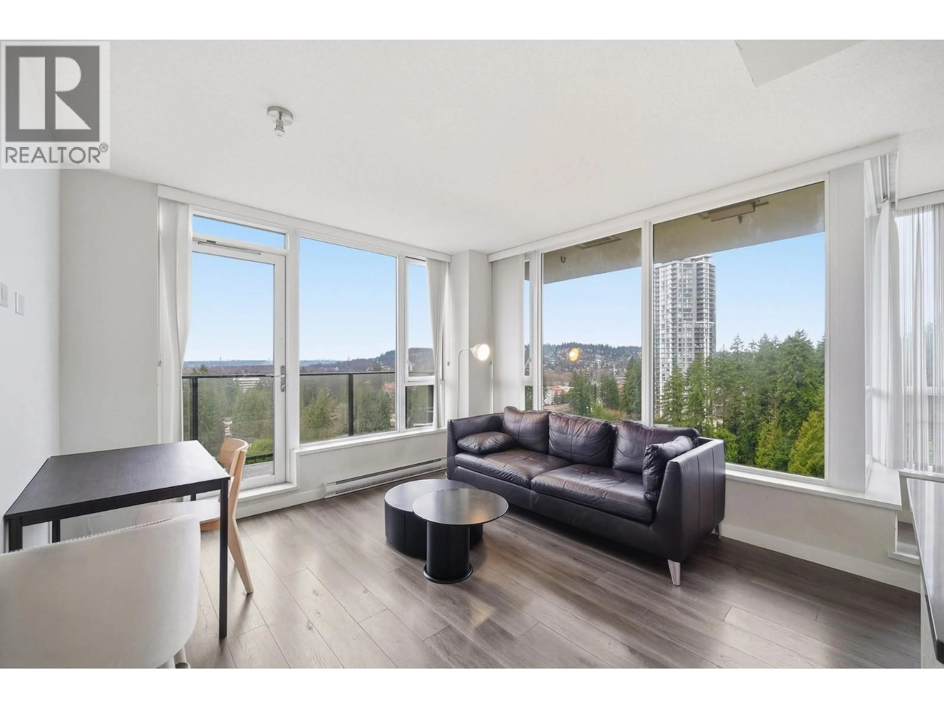 Living room with furniture, wood/laminate floor for 1403 - 3100 WINDSOR GATE, Coquitlam British Columbia V3B0P3