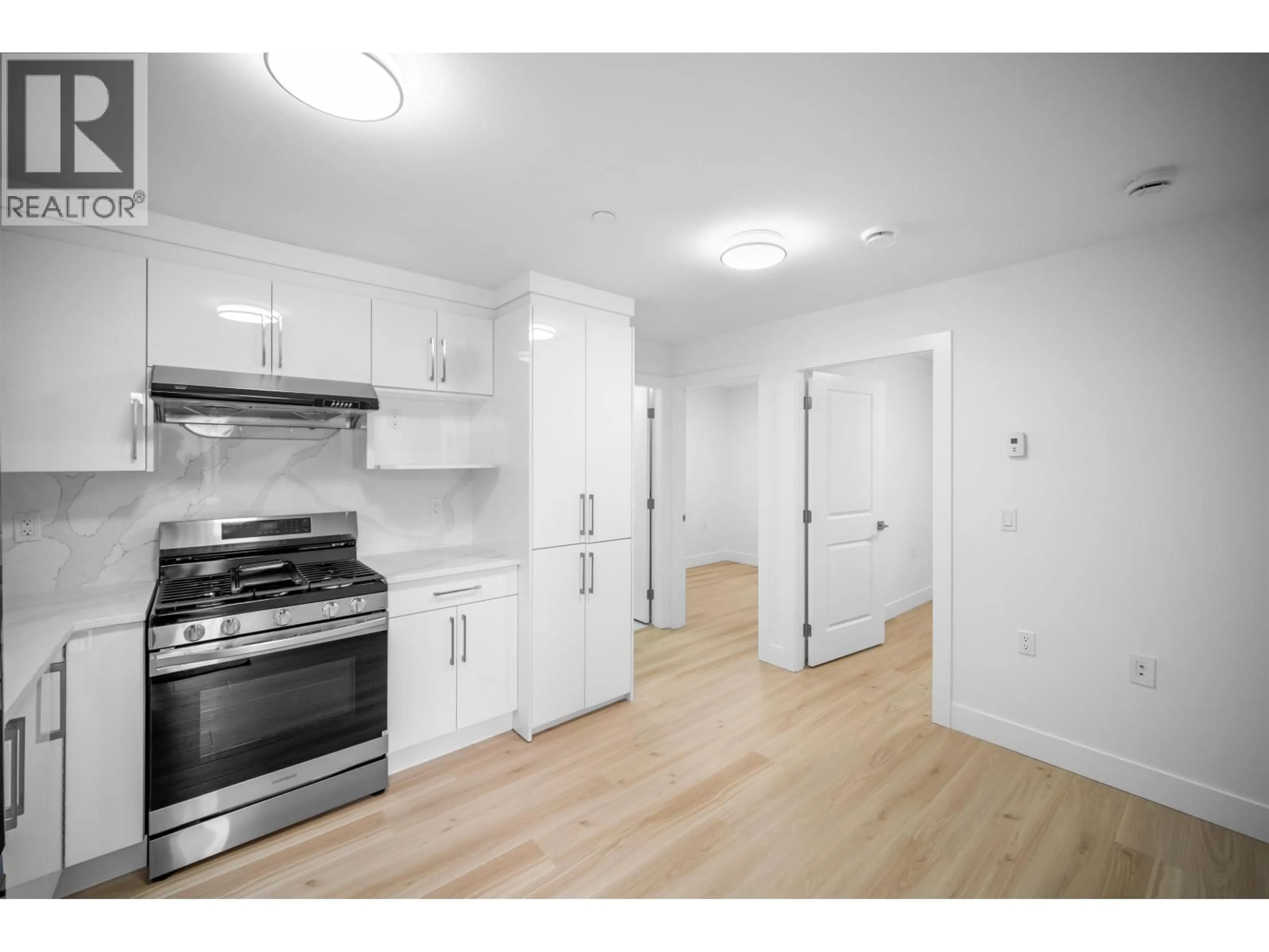 Standard kitchen, wood/laminate floor for 2172 46TH AVENUE, Vancouver British Columbia V5P1P4