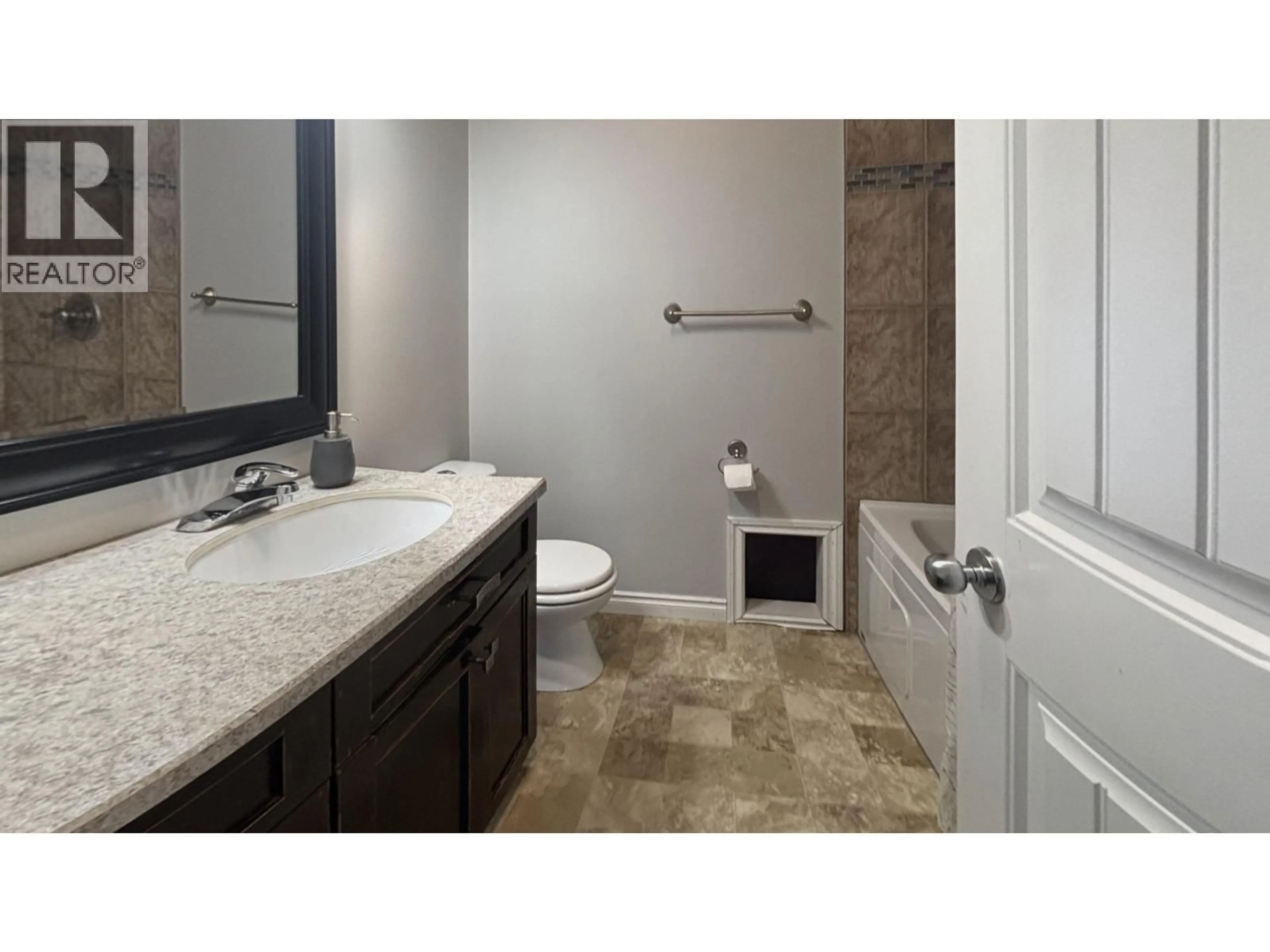 Standard bathroom, ceramic/tile floor for 9405 RIVER DRIVE, Fort St. John British Columbia V1J4M7