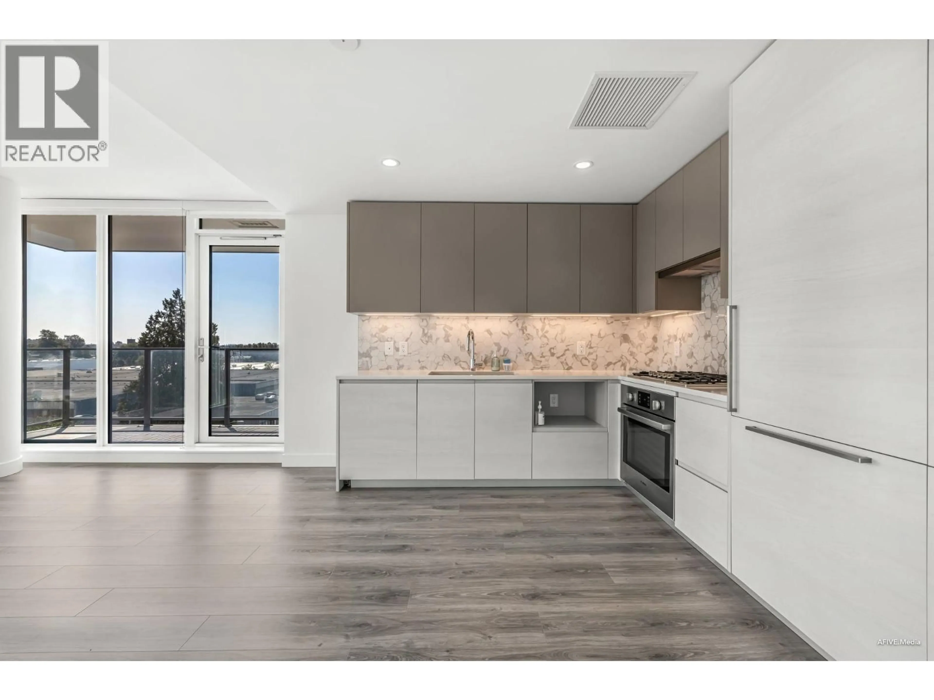 Open concept kitchen, unknown for 406 - 8181 CHESTER STREET, Vancouver British Columbia V5X0J9