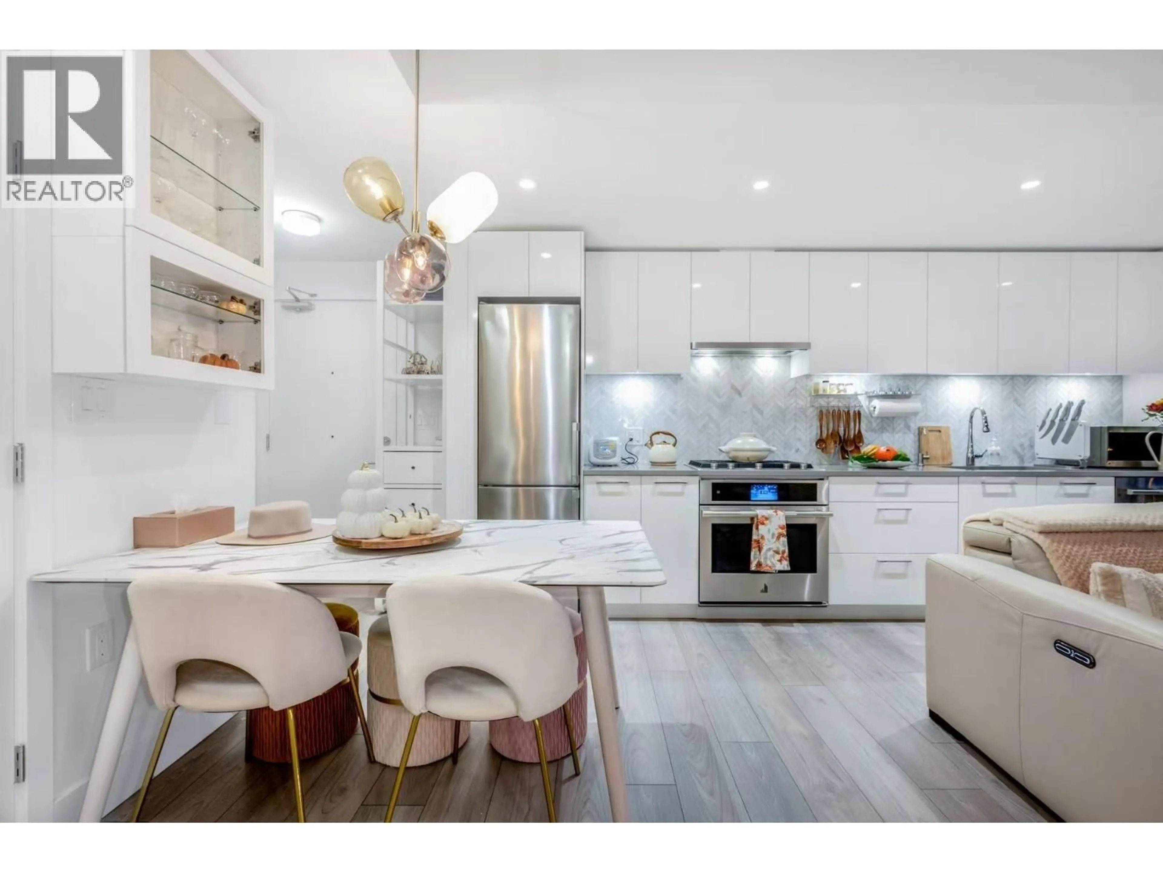Open concept kitchen, unknown for 411 - 3581 KENT AVENUE NORTH, Vancouver British Columbia V5S0H6