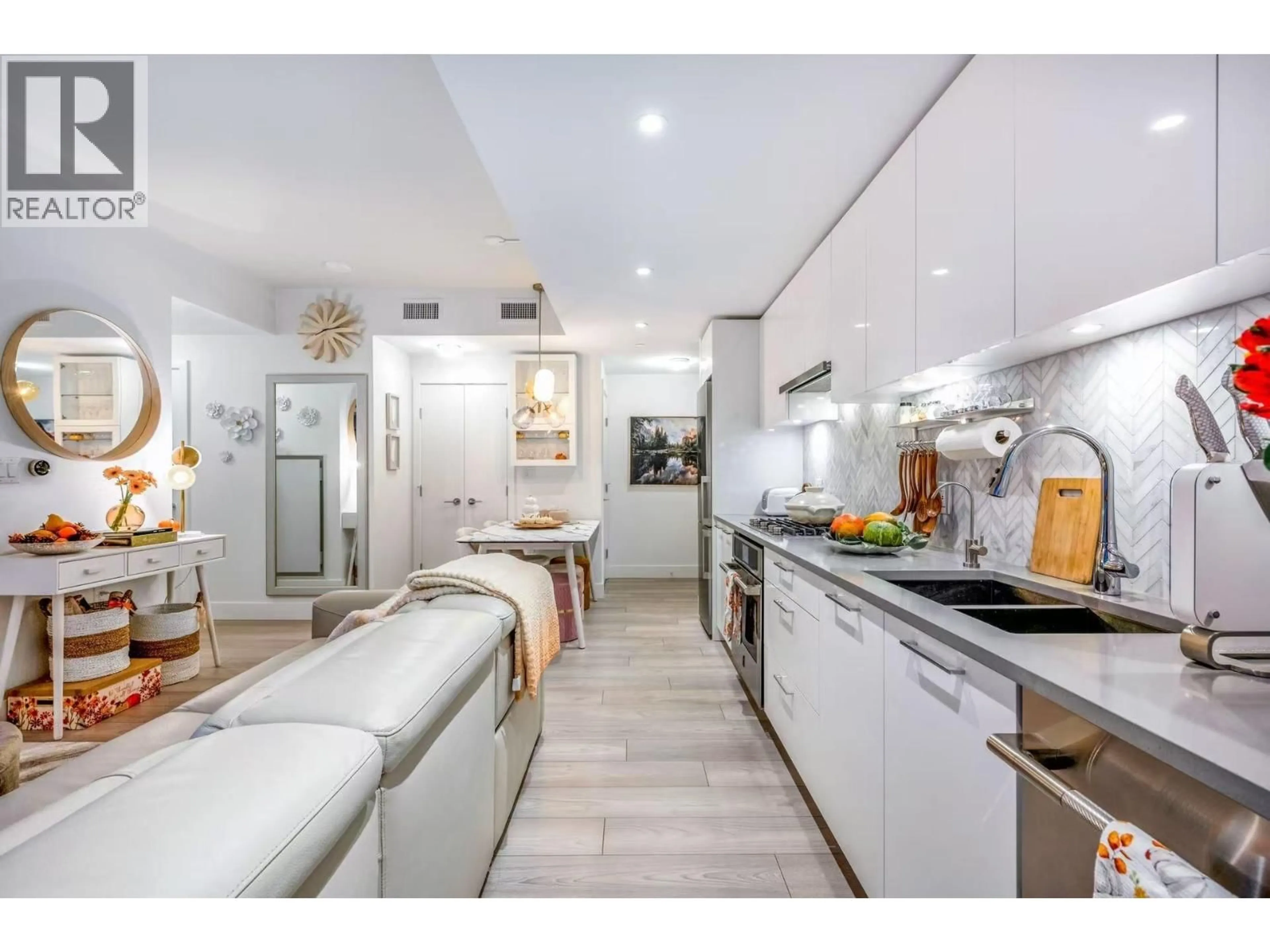 Open concept kitchen, unknown for 411 - 3581 KENT AVENUE NORTH, Vancouver British Columbia V5S0H6