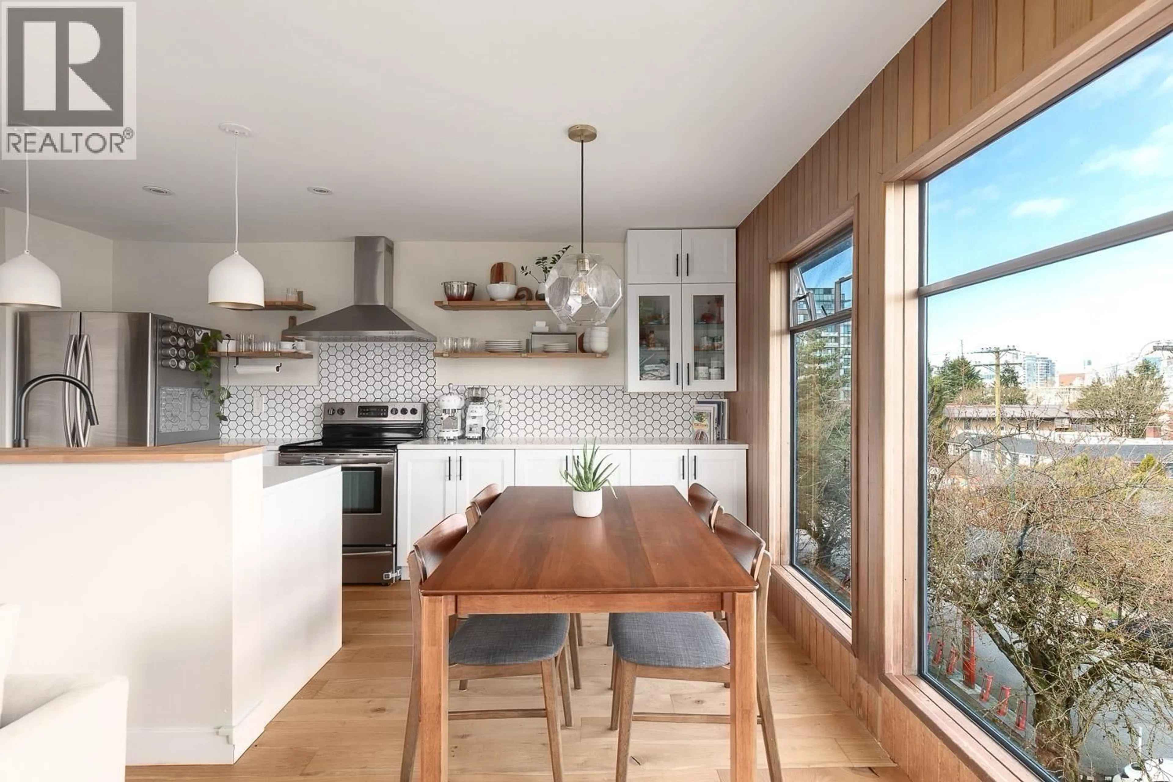 Contemporary kitchen, wood/laminate floor for 408 - 2222 PRINCE EDWARD STREET, Vancouver British Columbia V5T4M6