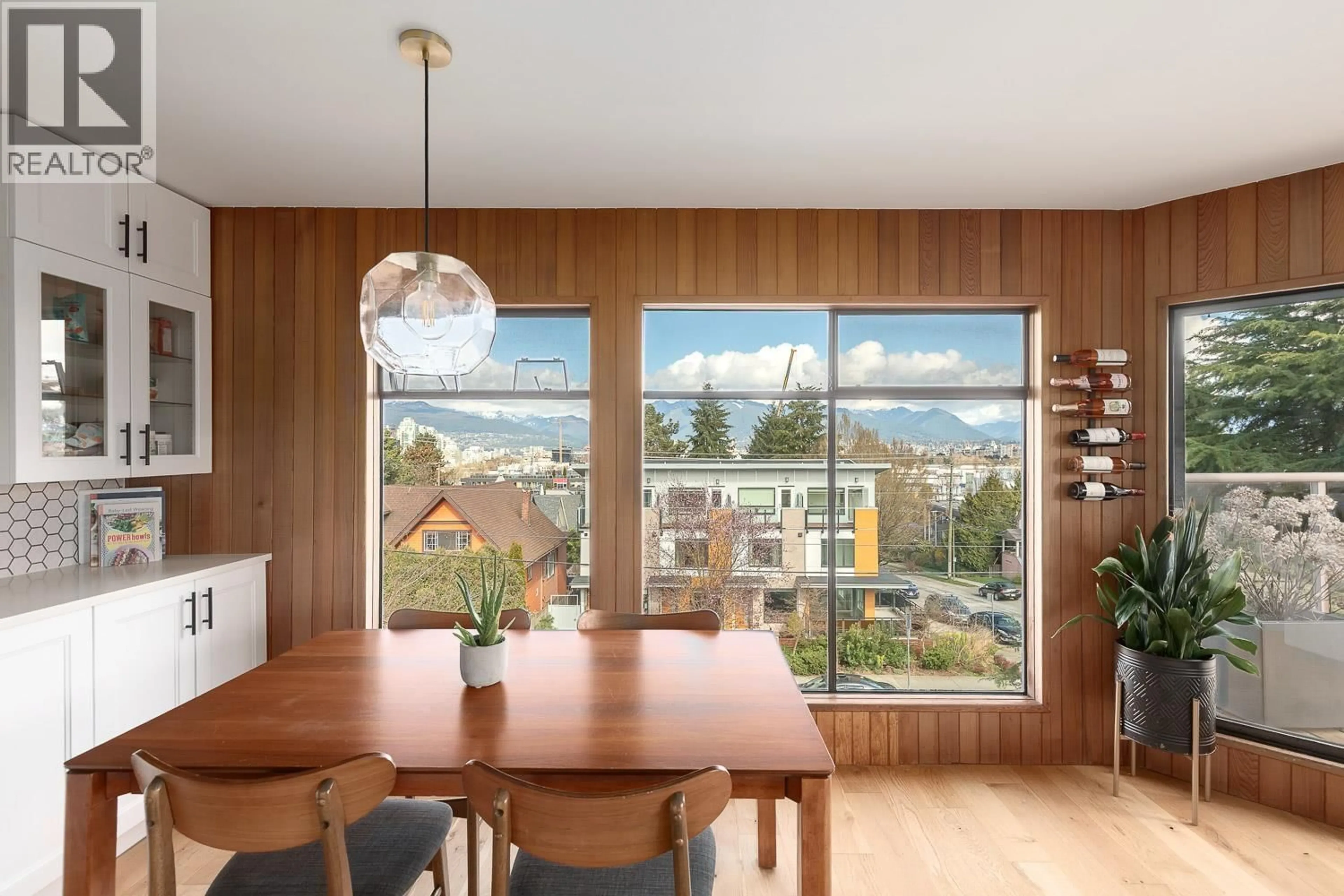 Dining room, wood/laminate floor for 408 - 2222 PRINCE EDWARD STREET, Vancouver British Columbia V5T4M6