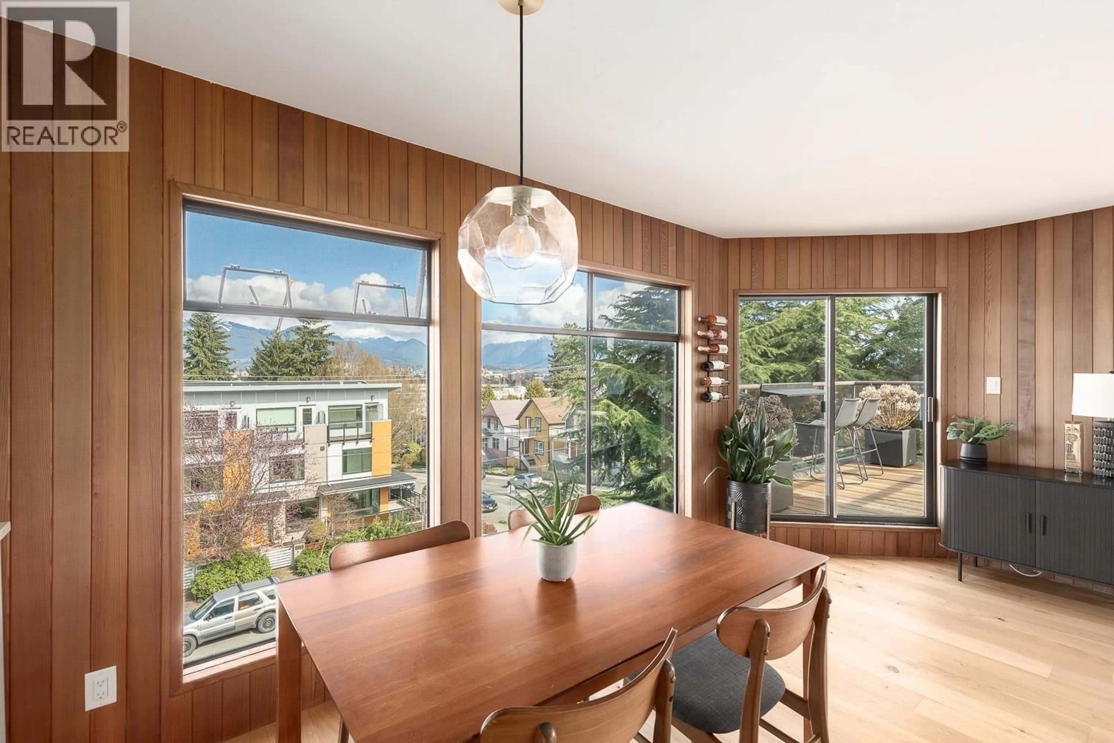 Dining room, wood/laminate floor for 408 - 2222 PRINCE EDWARD STREET, Vancouver British Columbia V5T4M6