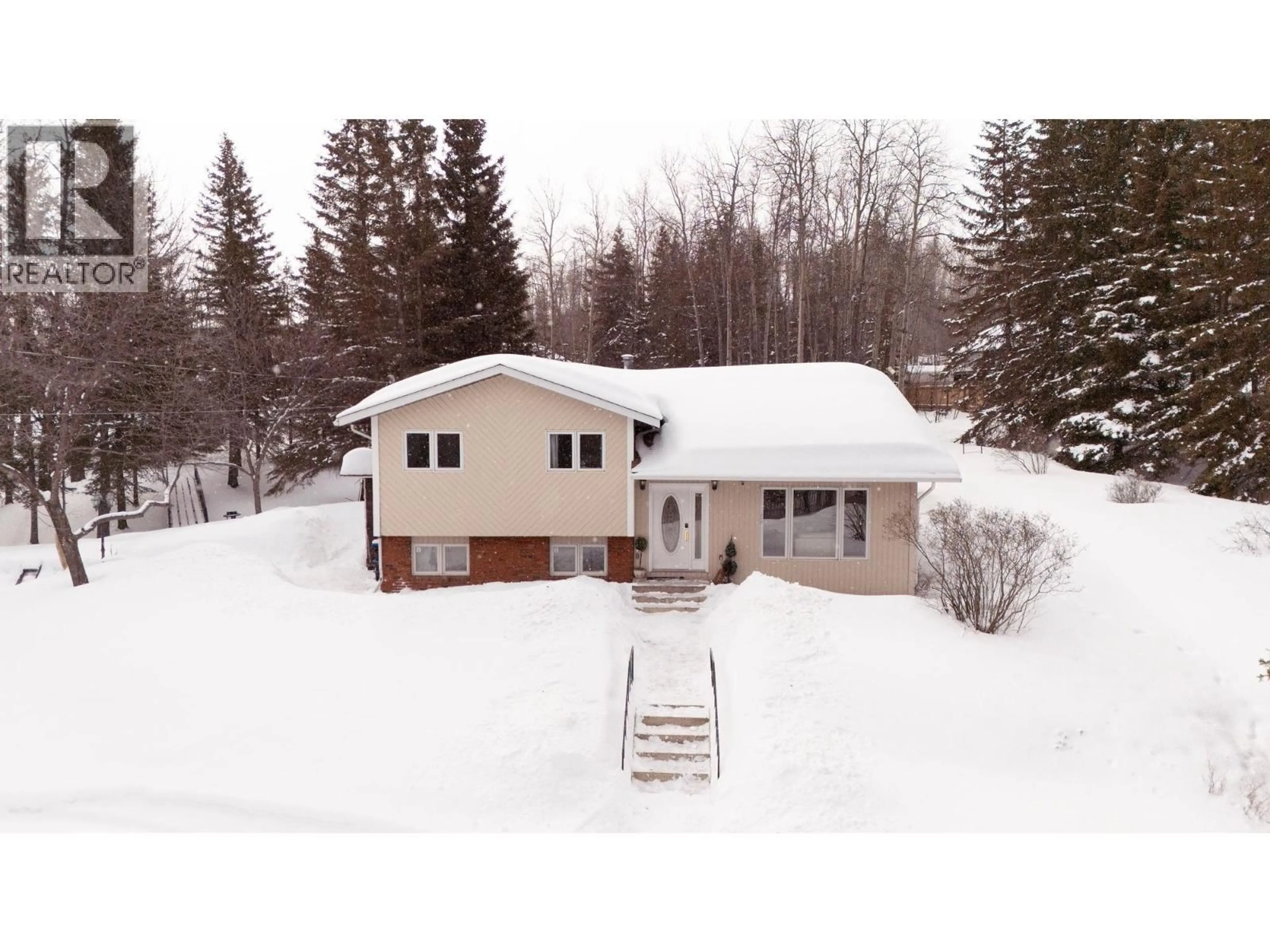 A pic from outside/outdoor area/front of a property/back of a property/a pic from drone, unknown for 12917 CHERRY ROAD, Fort St. John British Columbia V0C1H0
