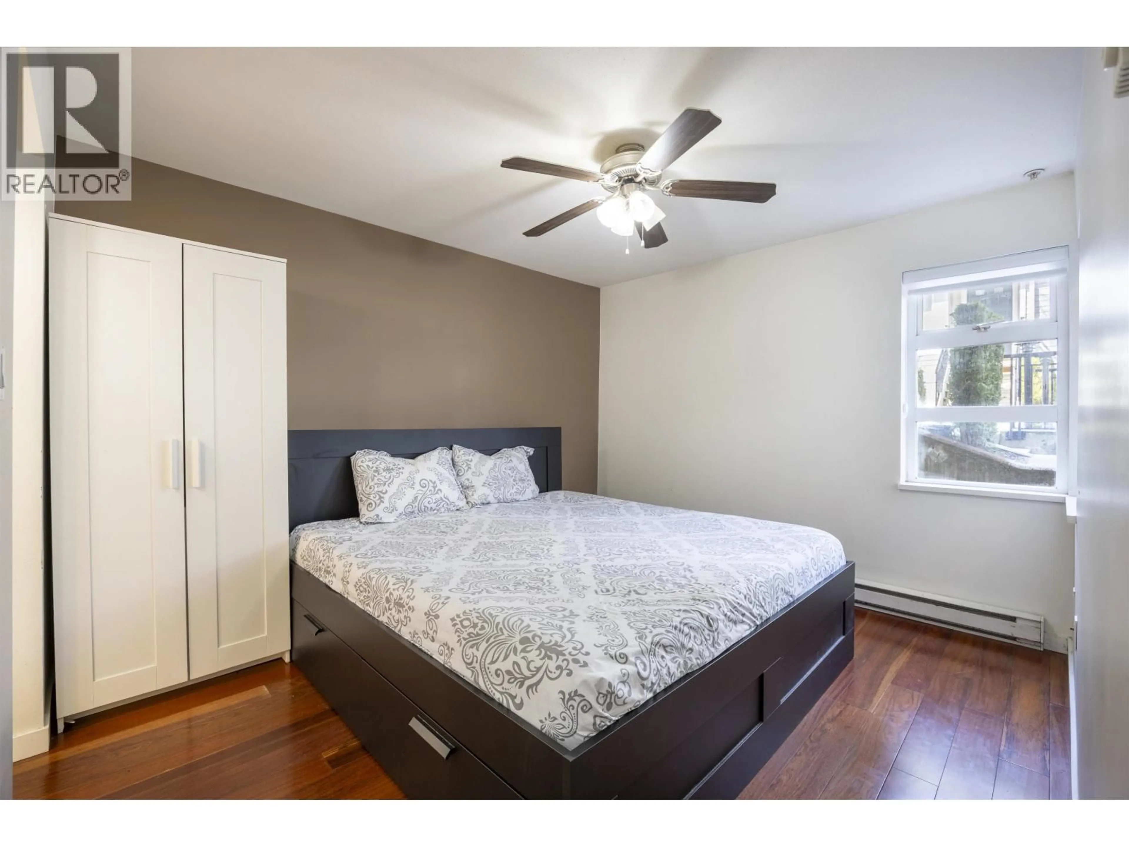 Bedroom with bed, wood/laminate floor for 41 - 6528 DENBIGH AVENUE, Burnaby British Columbia V5H3R8