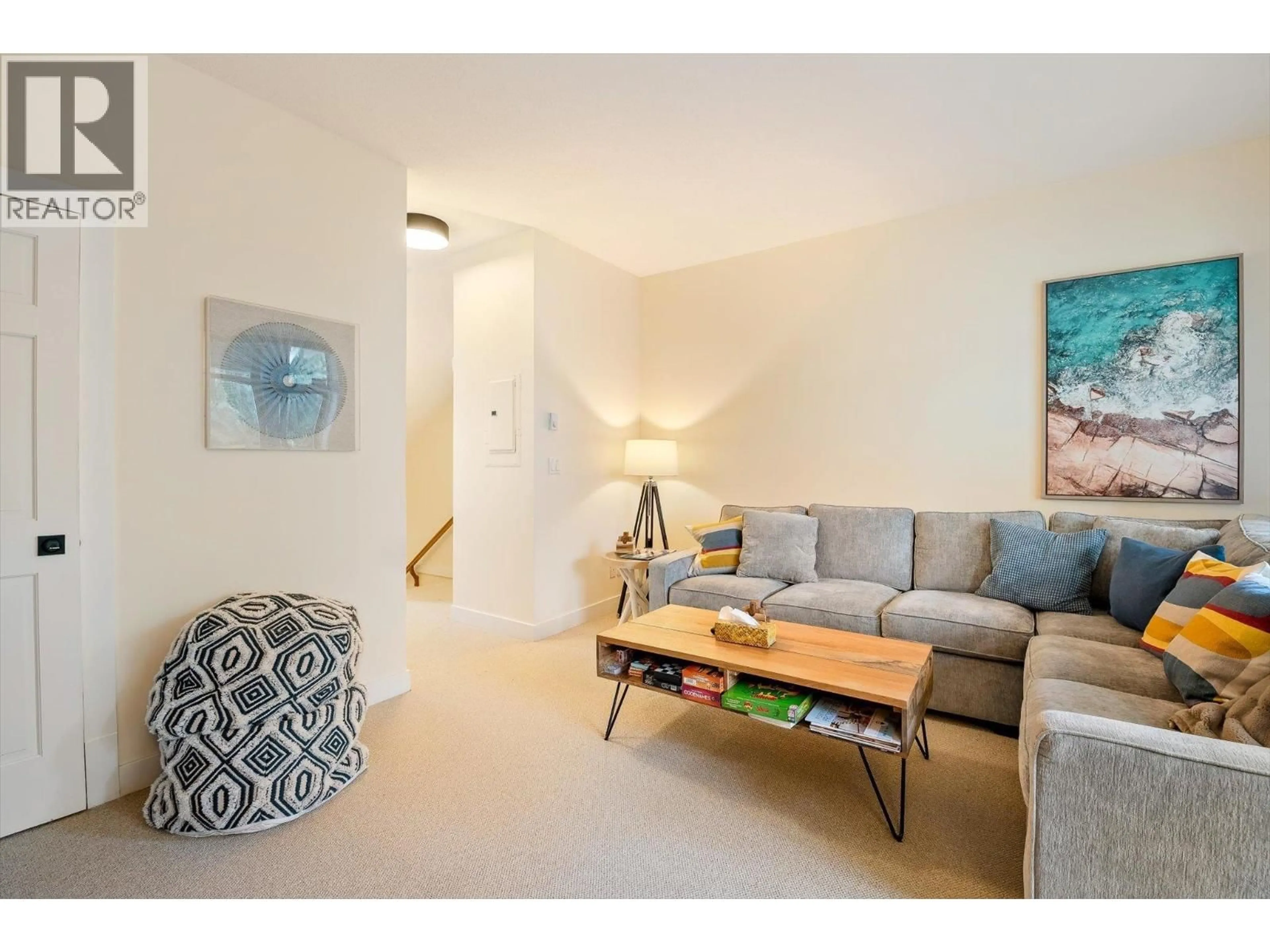 Living room with furniture, unknown for 203 - 4405 BLACKCOMB WAY, Whistler British Columbia V8E0X7