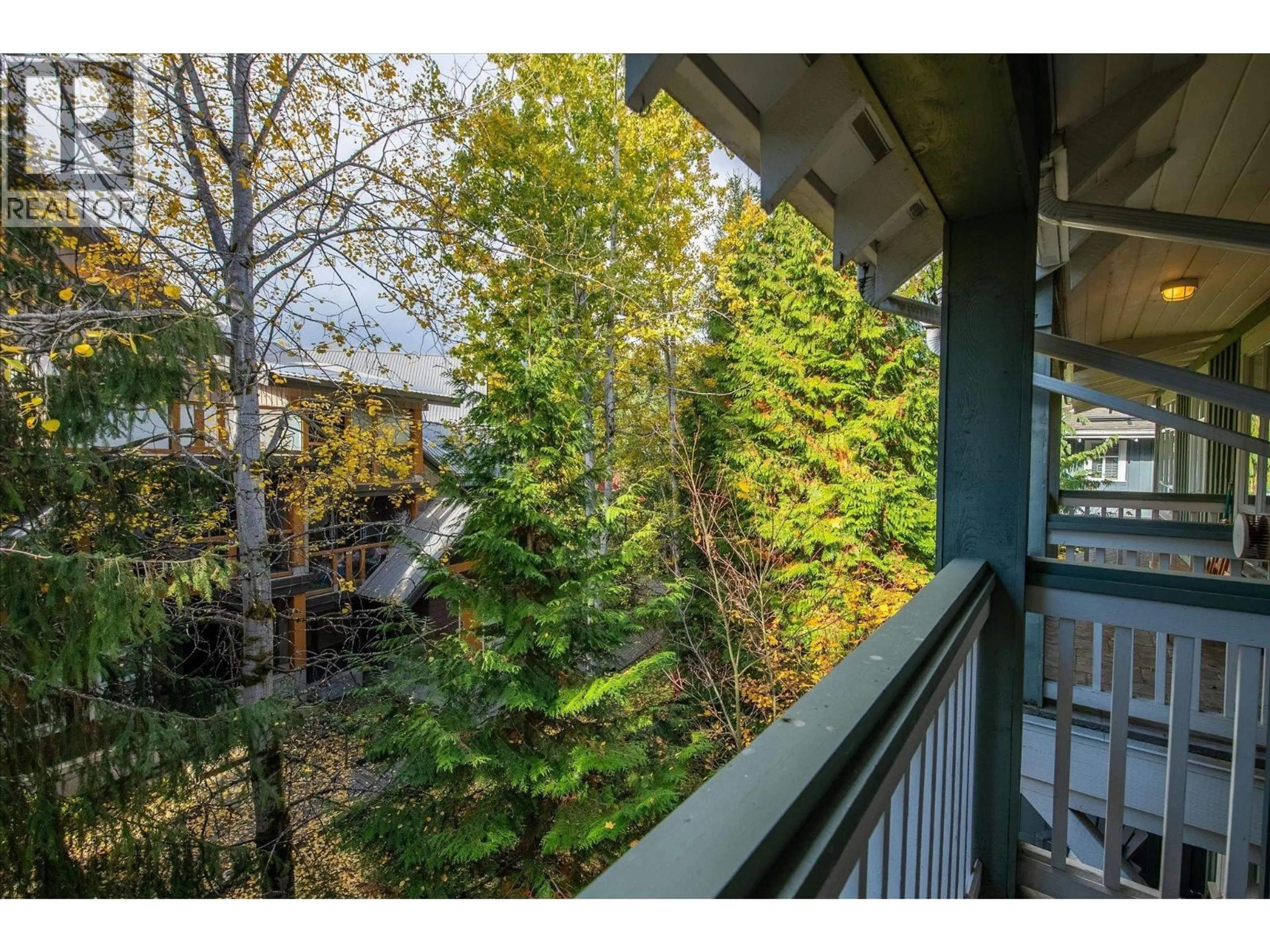 Balcony in the apartment, forest/trees view for 203 - 4405 BLACKCOMB WAY, Whistler British Columbia V8E0X7