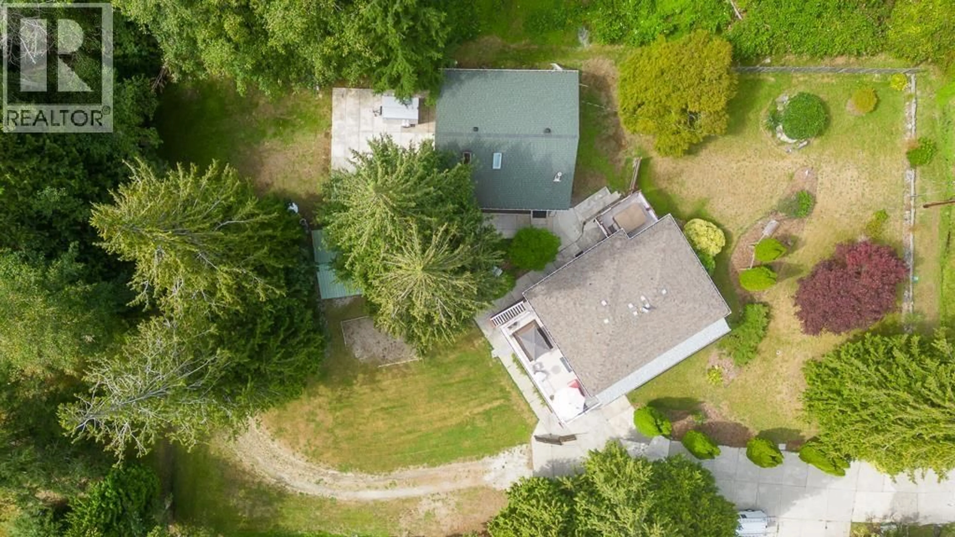 A pic from outside/outdoor area/front of a property/back of a property/a pic from drone, street for 7781 HART ROAD, Halfmoon Bay British Columbia V7Z1A2