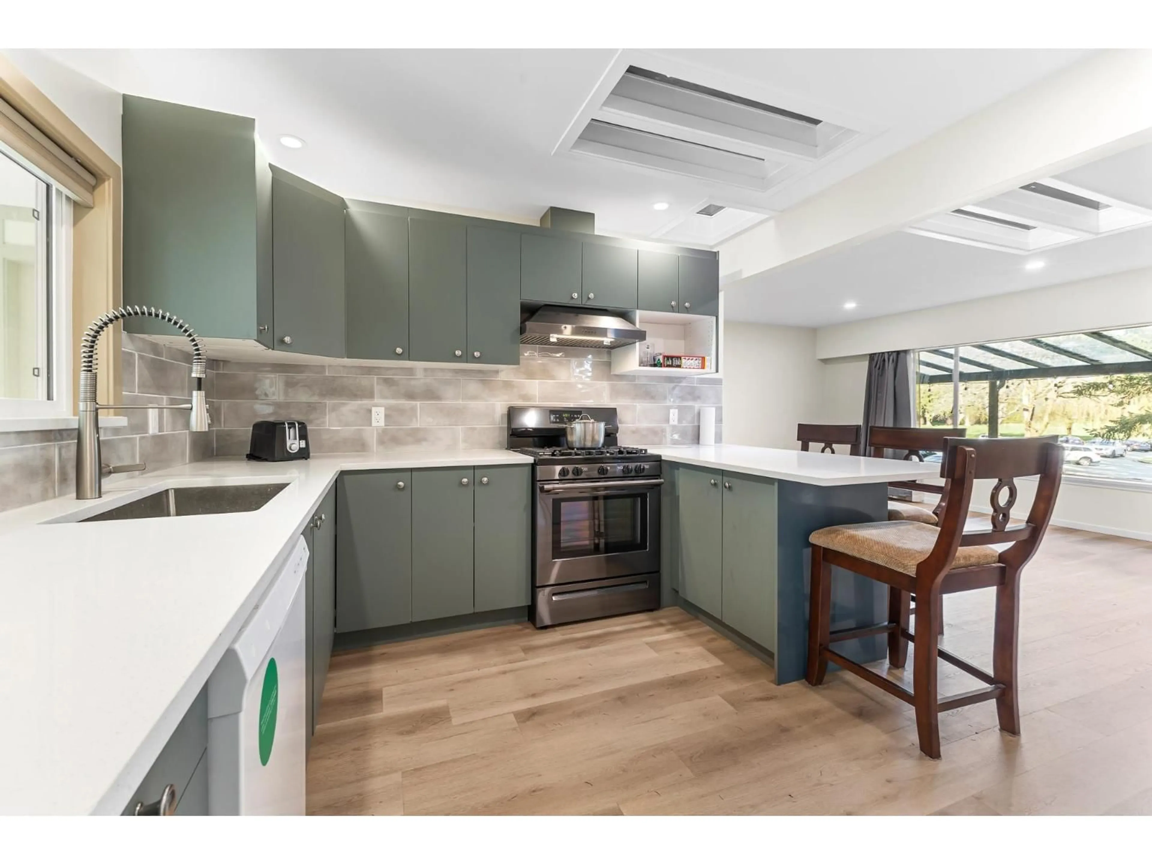 Open concept kitchen, ceramic/tile floor for 12930 OLD YALE ROAD, Surrey British Columbia V3T3B7