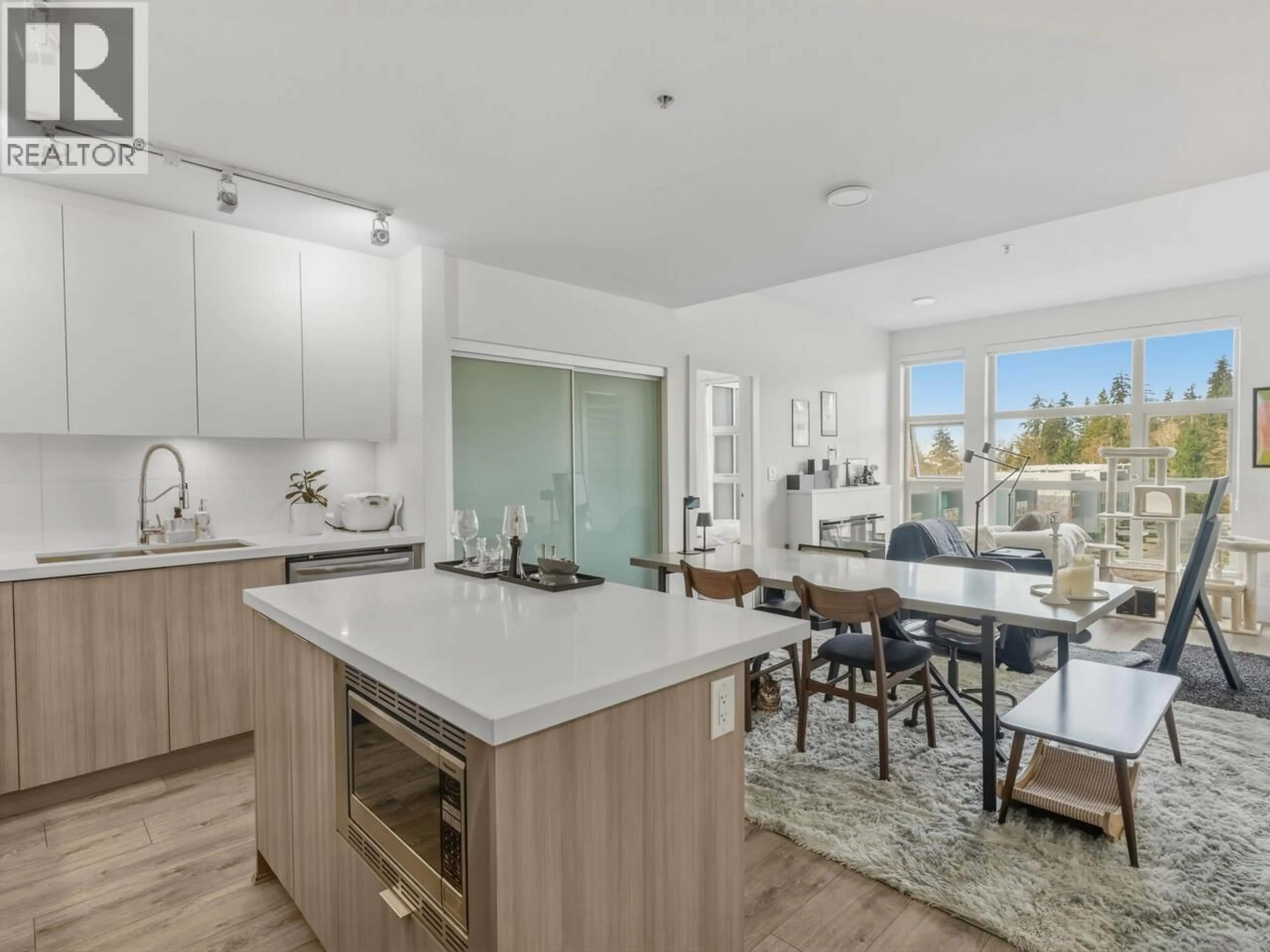 Open concept kitchen, unknown for 404 - 3602 ALDERCREST DRIVE, North Vancouver British Columbia V7G2S6