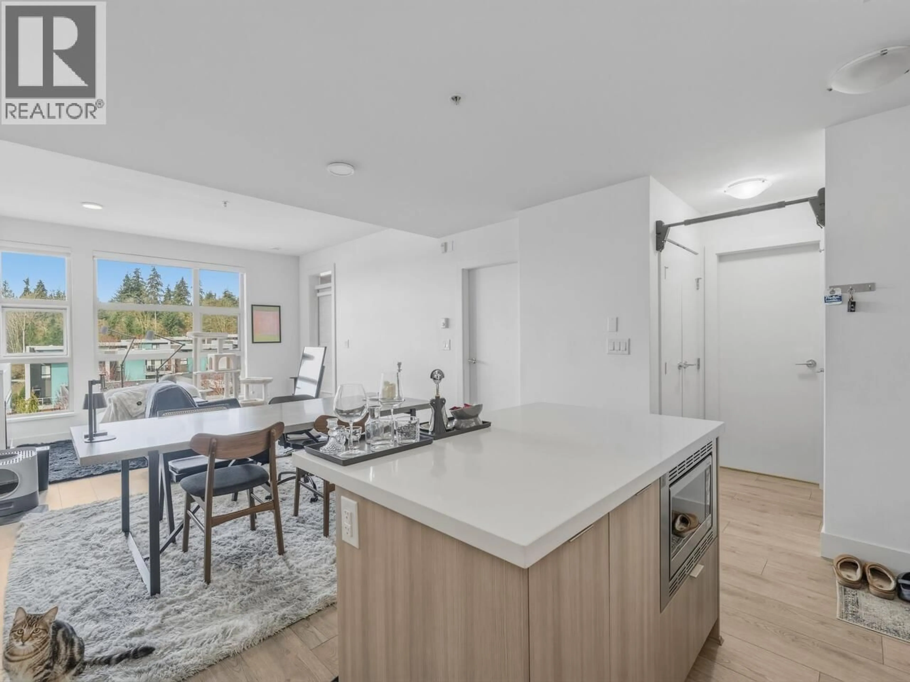 Open concept kitchen, unknown for 404 - 3602 ALDERCREST DRIVE, North Vancouver British Columbia V7G2S6