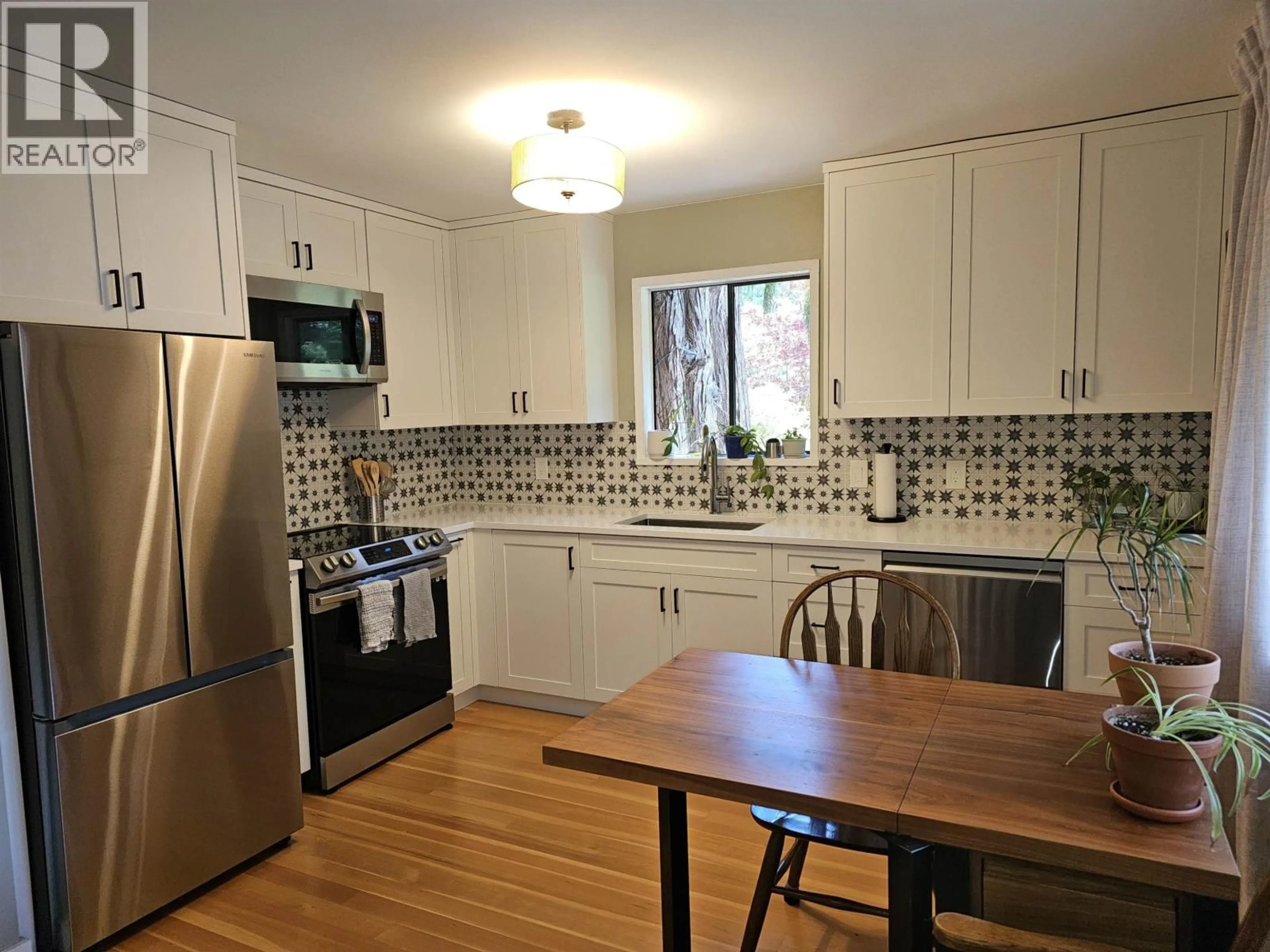 Standard kitchen, wood/laminate floor for 12649 MERRILL CRESCENT, Pender Harbour British Columbia V0N2H1