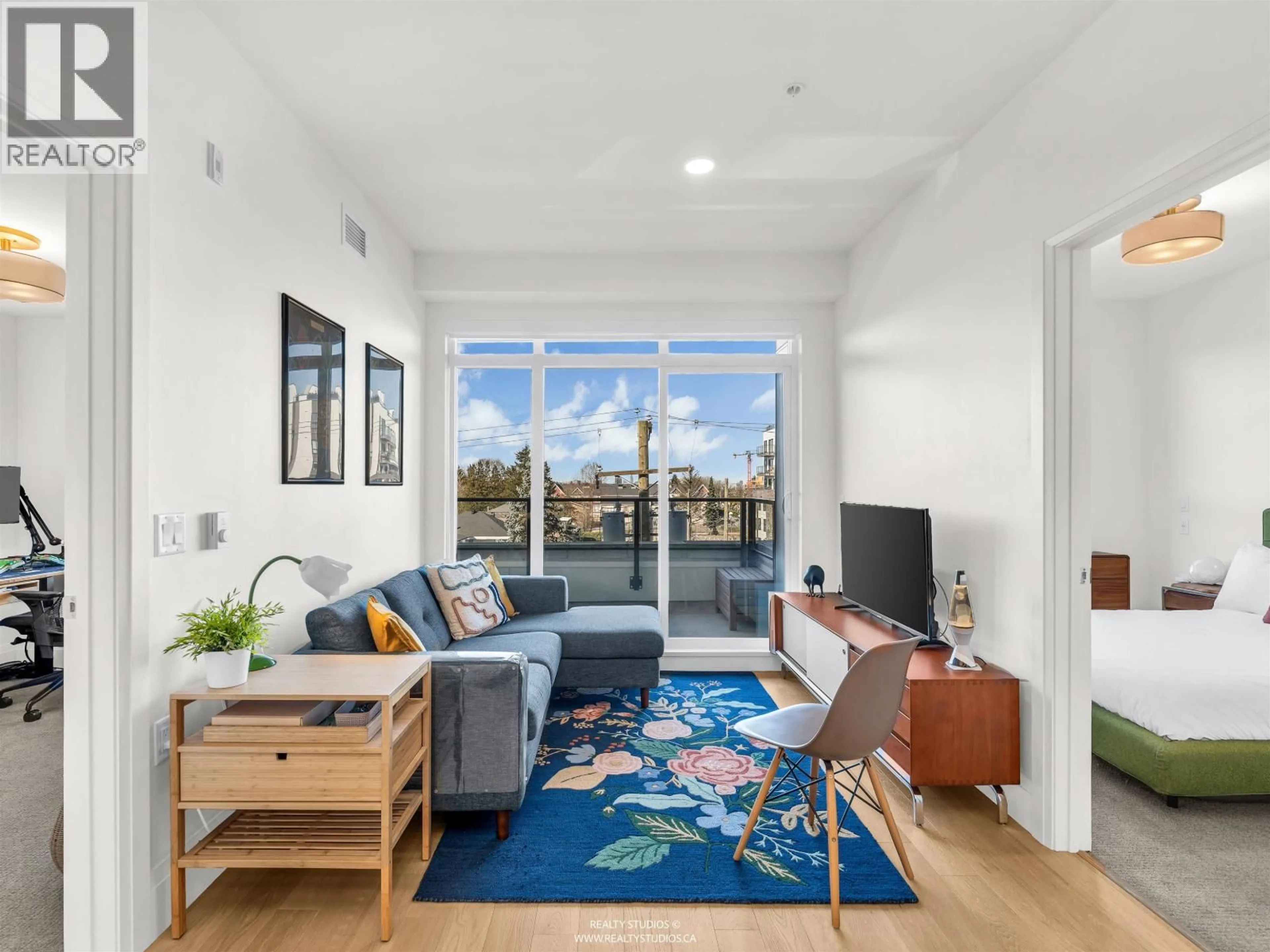 Living room with furniture, unknown for 409 - 2550 GARDEN DRIVE, Vancouver British Columbia V5N4X6