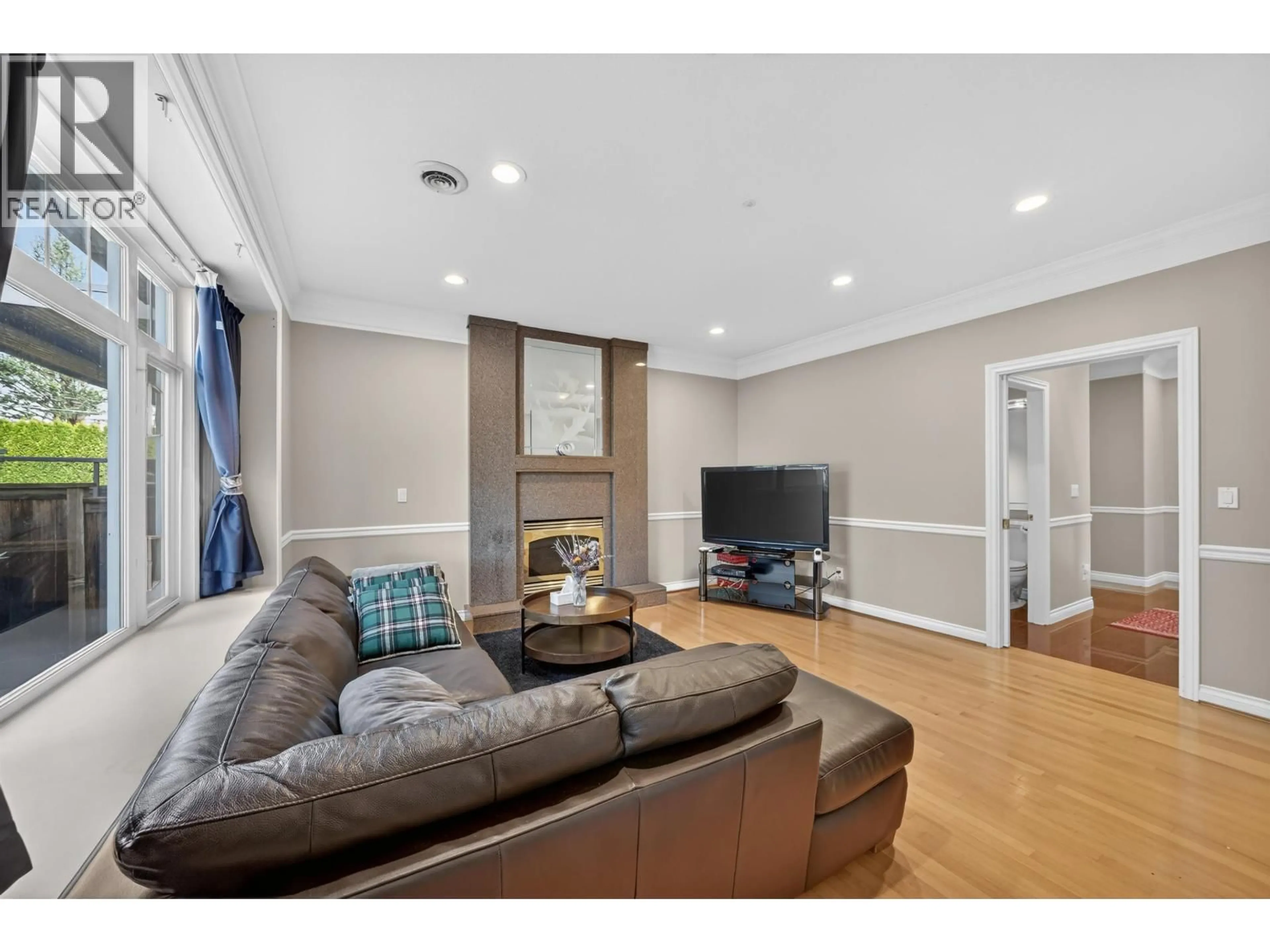 Living room with furniture, wood/laminate floor for 6309 ALBERTA STREET, Vancouver British Columbia V5Y3N3
