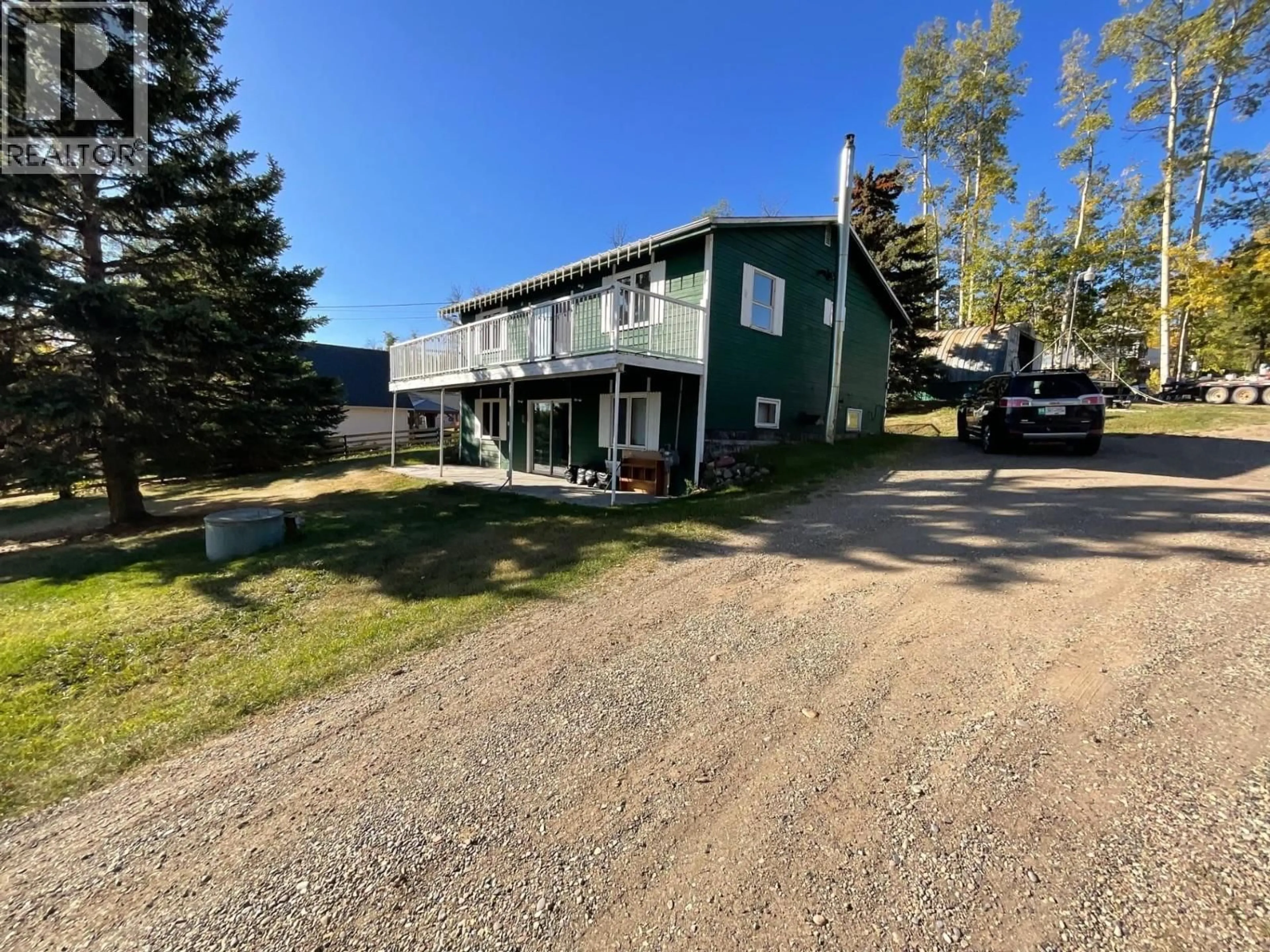 A pic from outside/outdoor area/front of a property/back of a property/a pic from drone, unknown for 13235 LAKESHORE DRIVE, Charlie Lake British Columbia V1J8G1