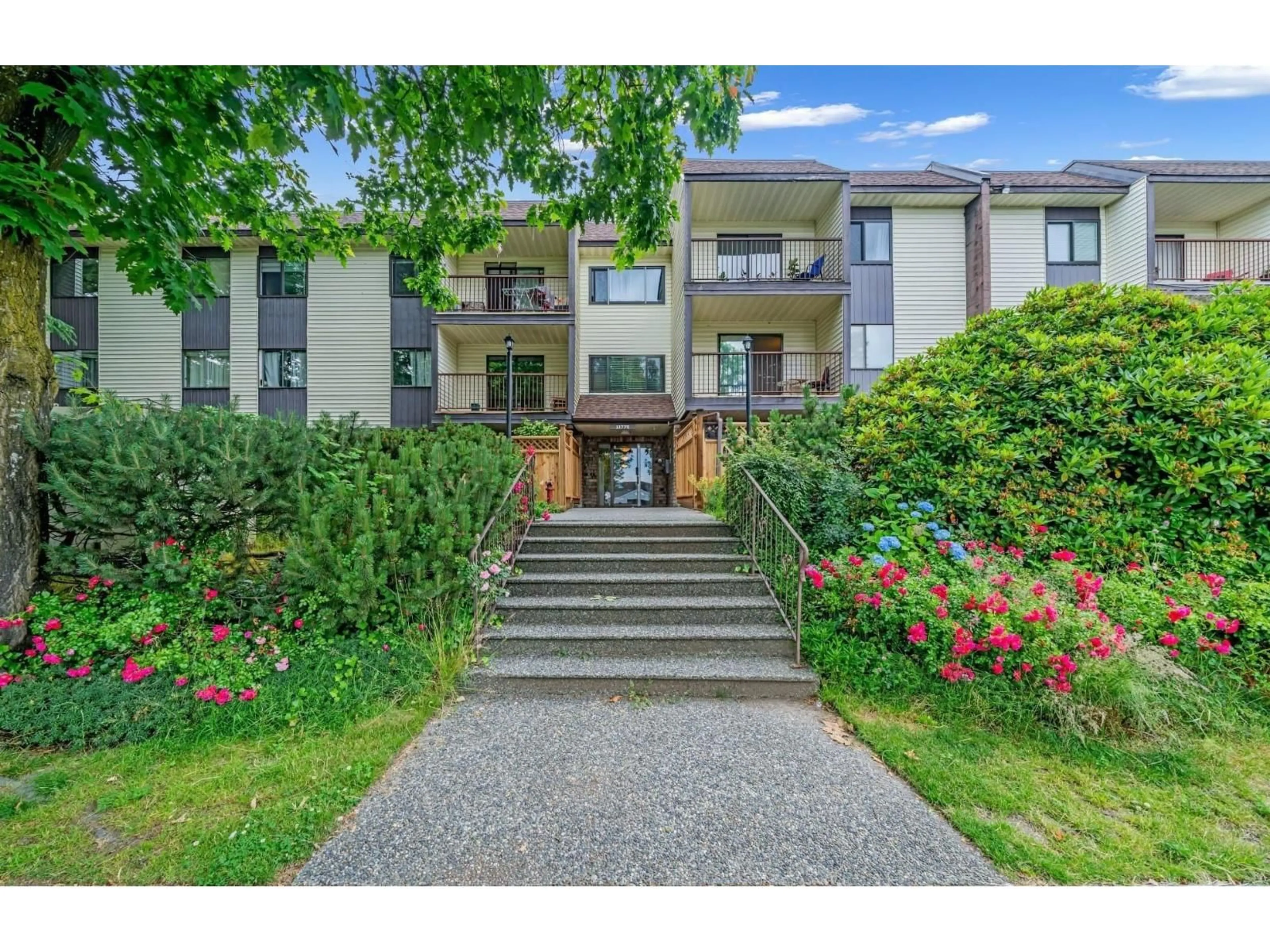 A pic from outside/outdoor area/front of a property/back of a property/a pic from drone, unknown for 103 - 13775 74 AVENUE, Surrey British Columbia V3W9C5