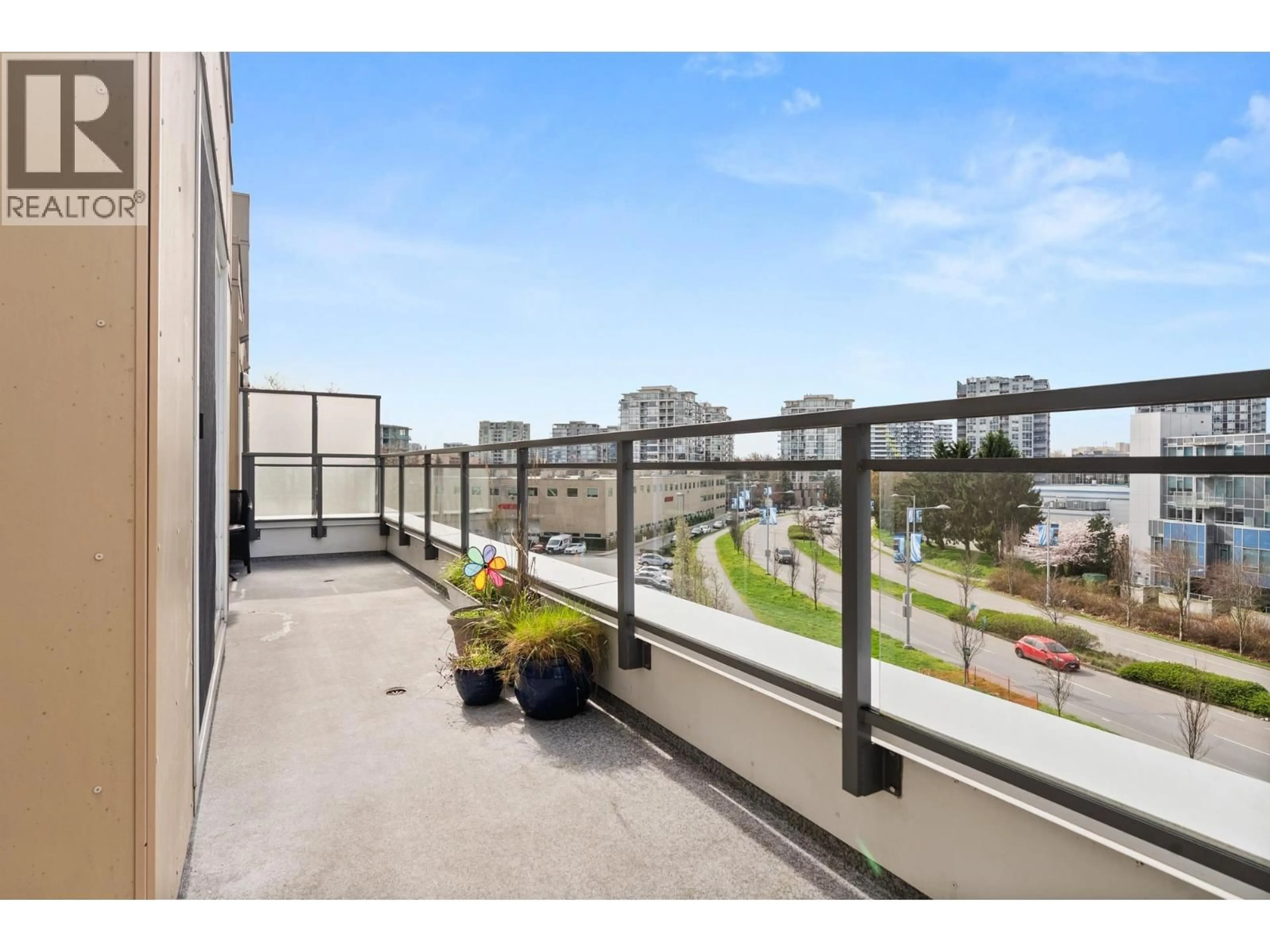 Balcony in the apartment, city buildings view from balcony for 523 - 5311 CEDARBRIDGE WAY, Richmond British Columbia V6X0M3