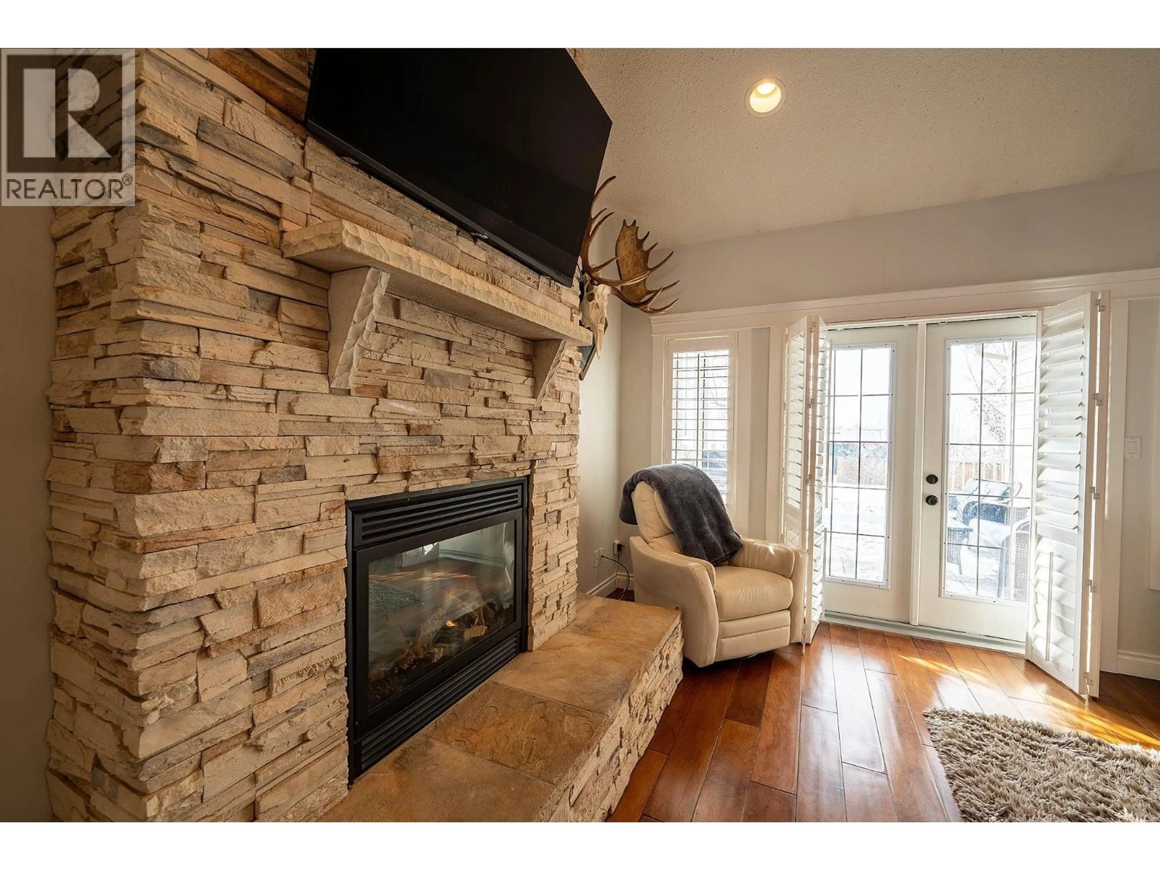 Living room with furniture, unknown for 8607 109 AVENUE, Fort St. John British Columbia V1J7E6