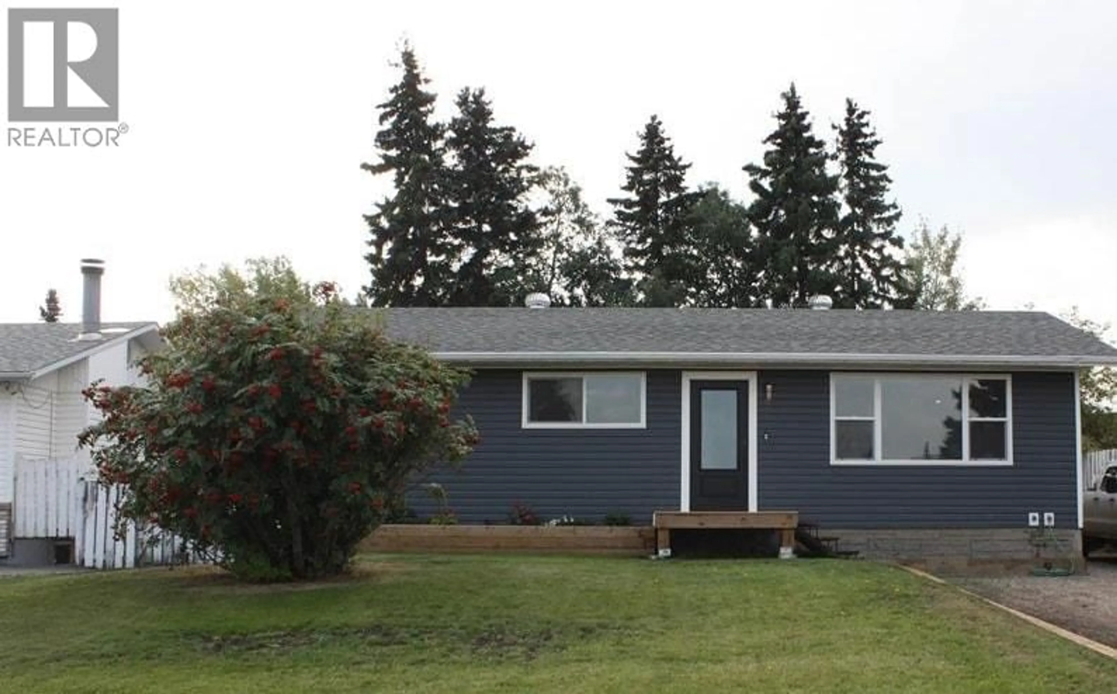 Home with vinyl exterior material, street for 9811 112 AVENUE, Fort St. John British Columbia V1J2W4