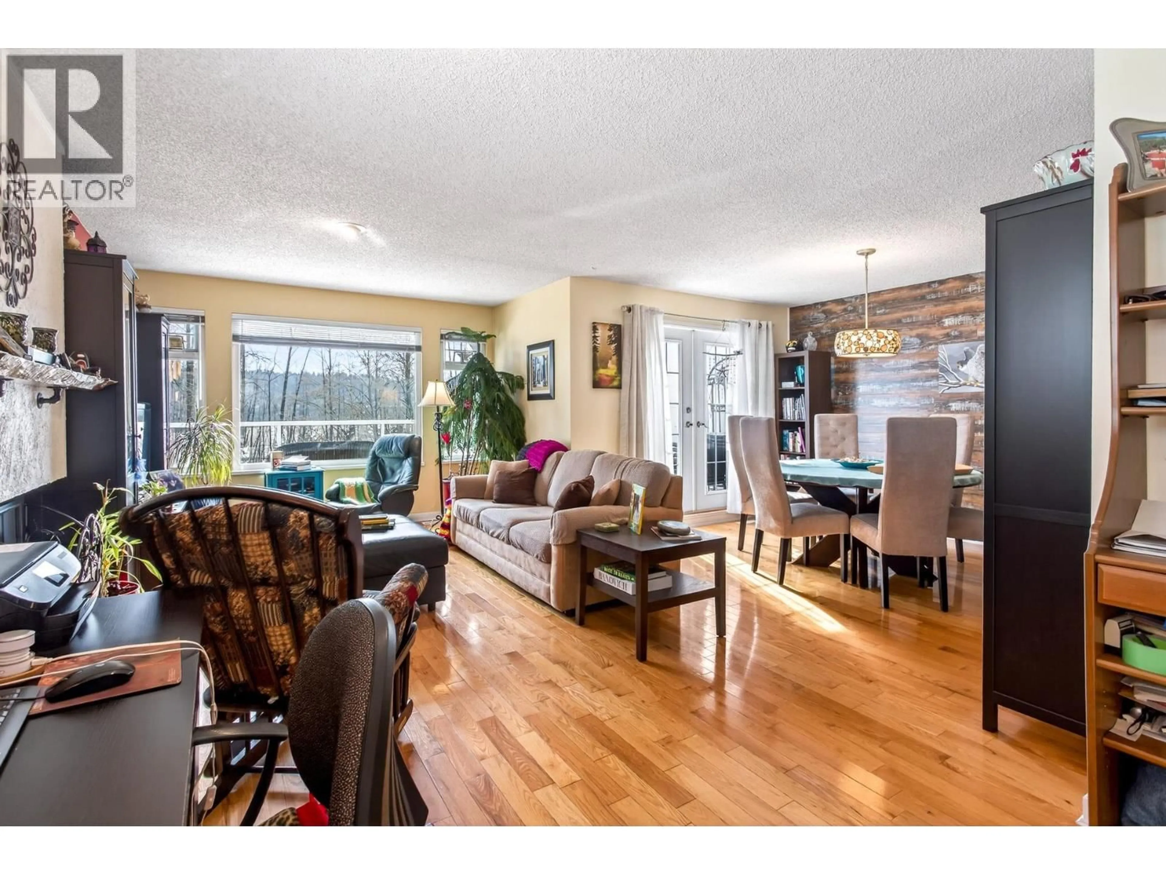 Living room with furniture, wood/laminate floor for 481 SAN REMO DRIVE, Port Moody British Columbia V3H3S6