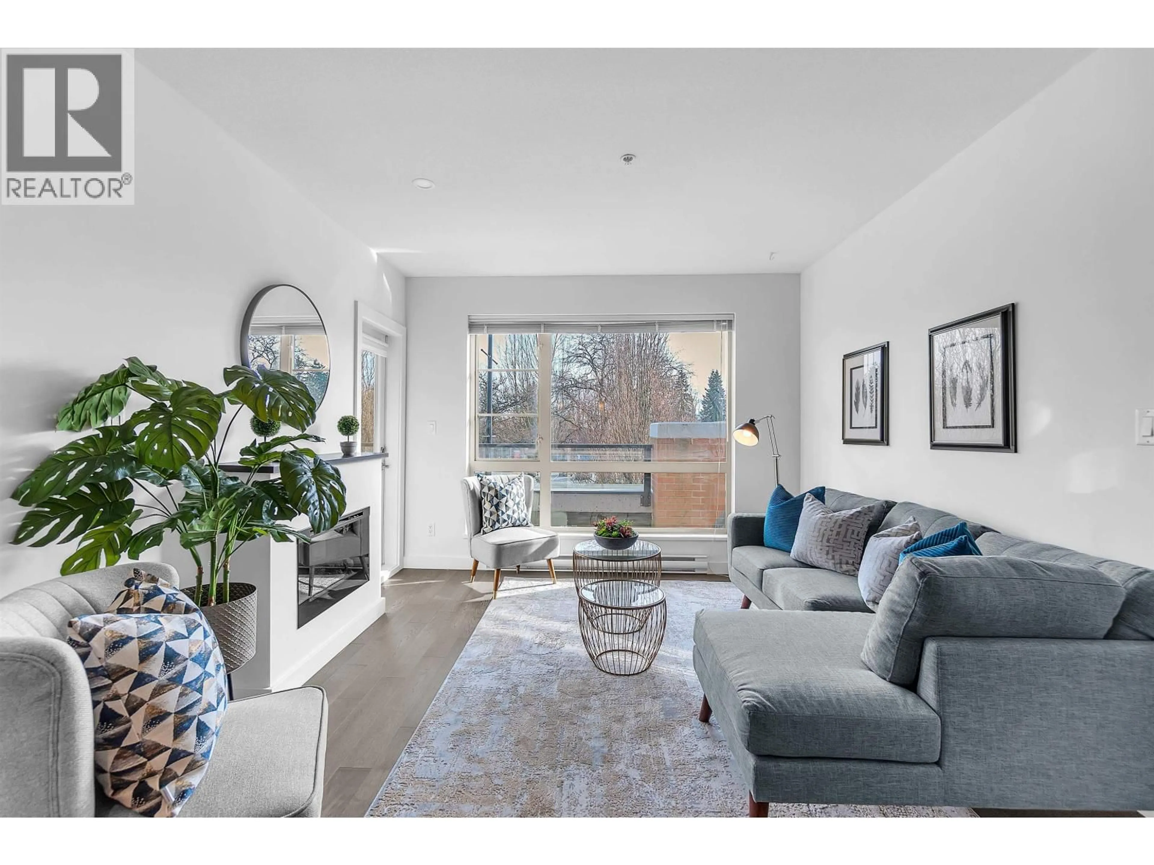 Living room with furniture, unknown for 202 - 1330 MARINE DRIVE, North Vancouver British Columbia V7P1T4