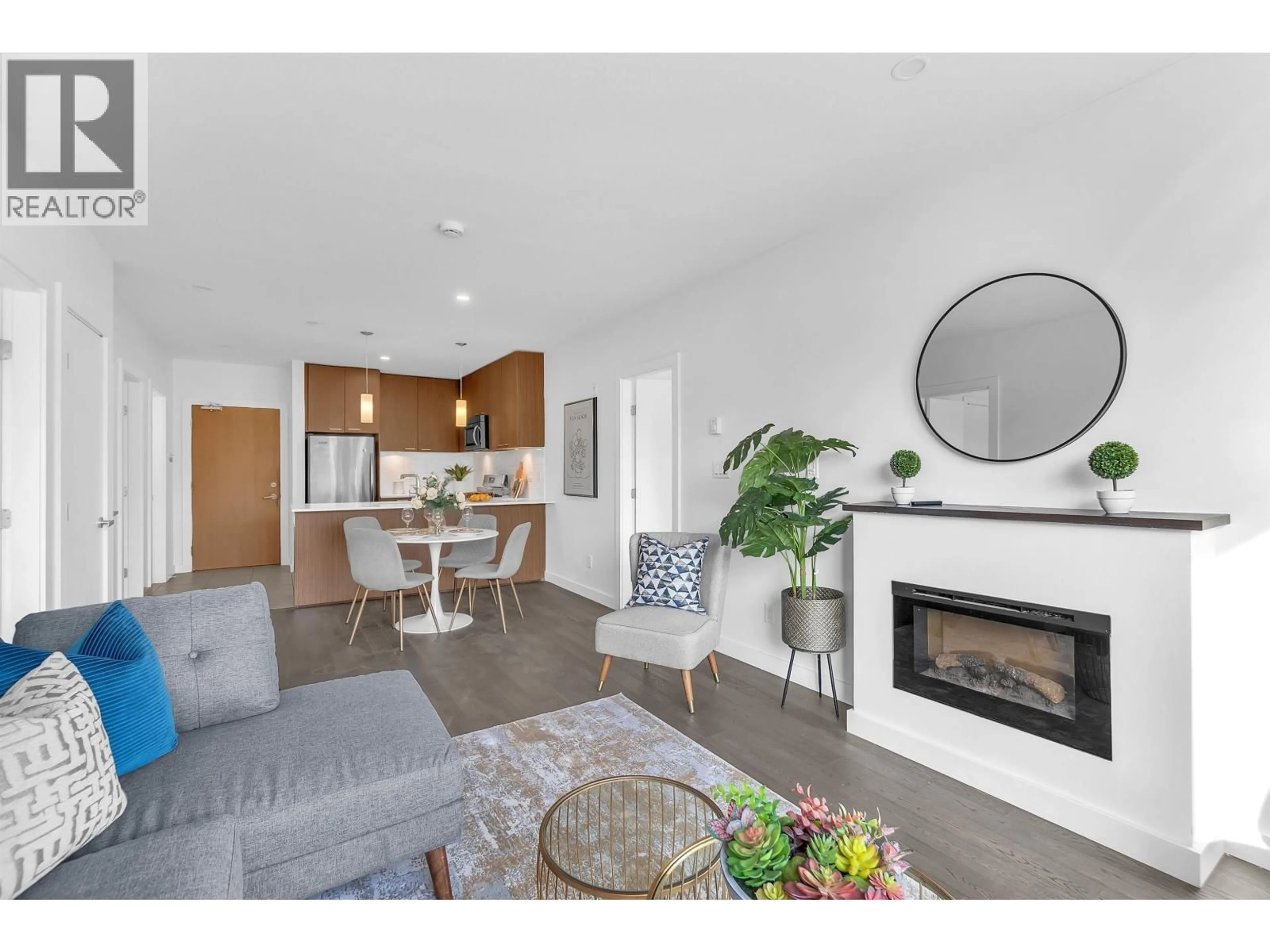 Living room with furniture, wood/laminate floor for 202 - 1330 MARINE DRIVE, North Vancouver British Columbia V7P1T4
