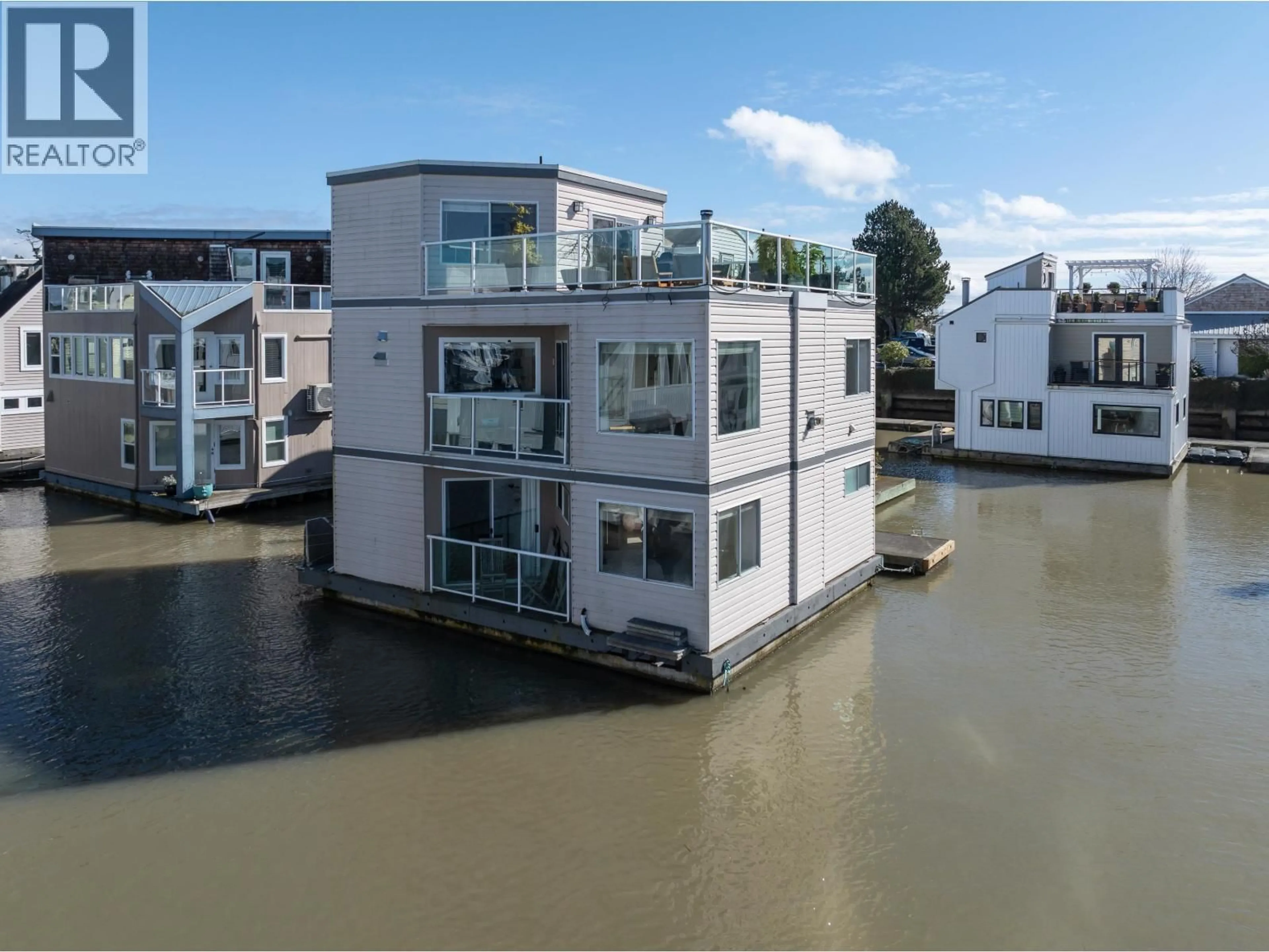 A pic from outside/outdoor area/front of a property/back of a property/a pic from drone, water/lake/river/ocean view for 15 - 3459 W RIVER ROAD, Delta British Columbia V4K4Y6