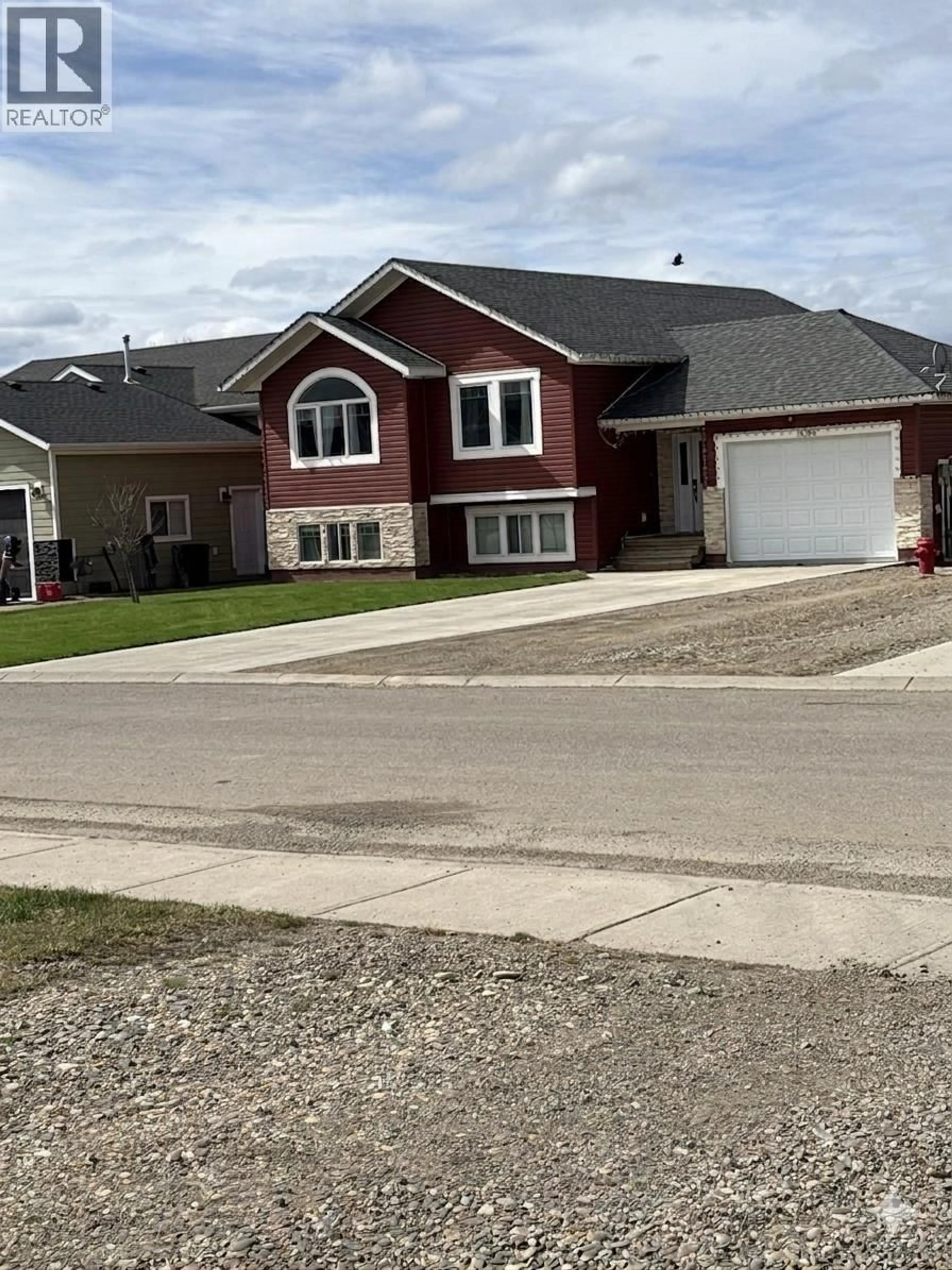 Home with vinyl exterior material, street for 10256 97 STREET, Taylor British Columbia V0C2K0