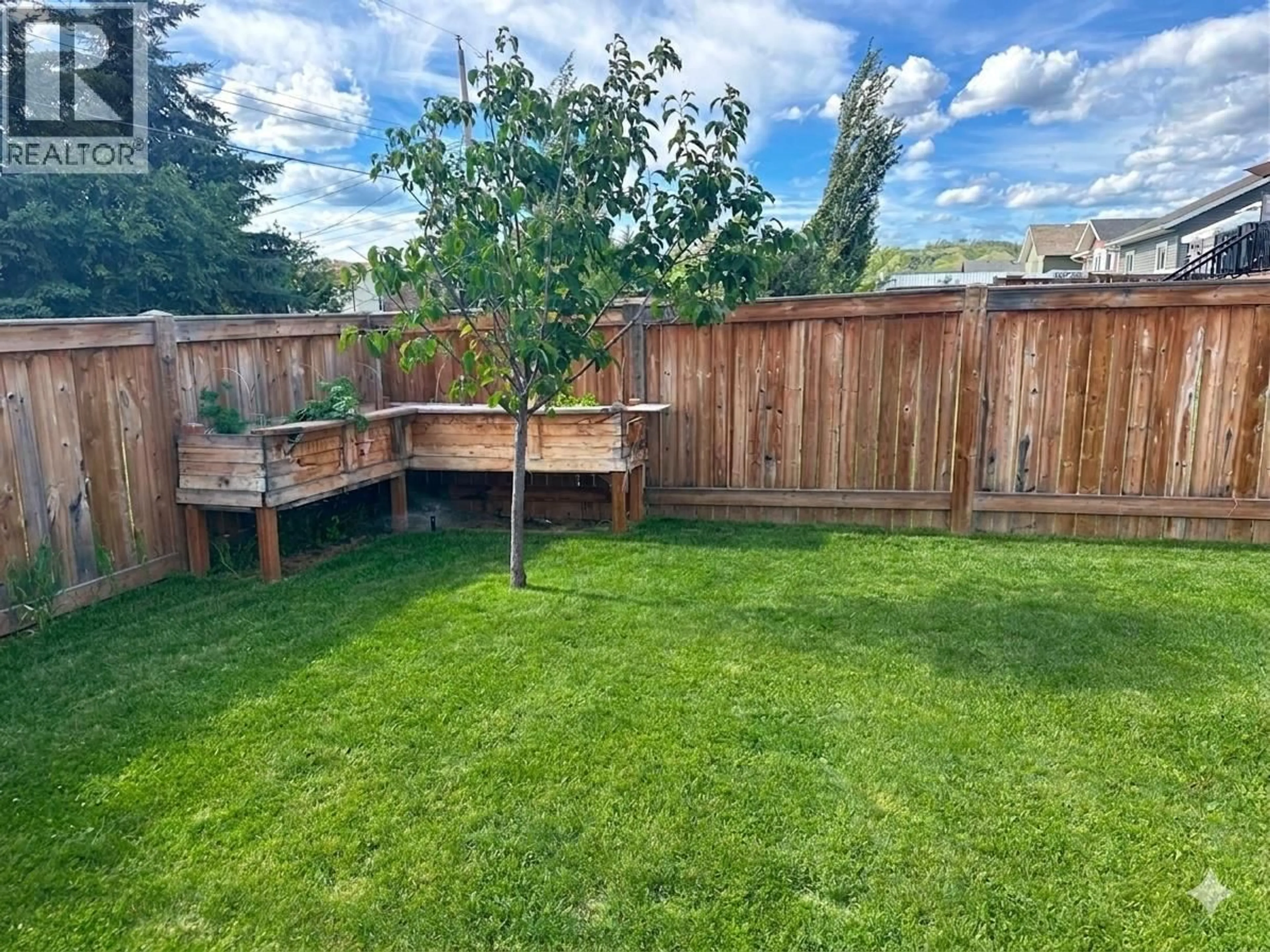 A pic from outside/outdoor area/front of a property/back of a property/a pic from drone, forest/trees view for 10256 97 STREET, Taylor British Columbia V0C2K0