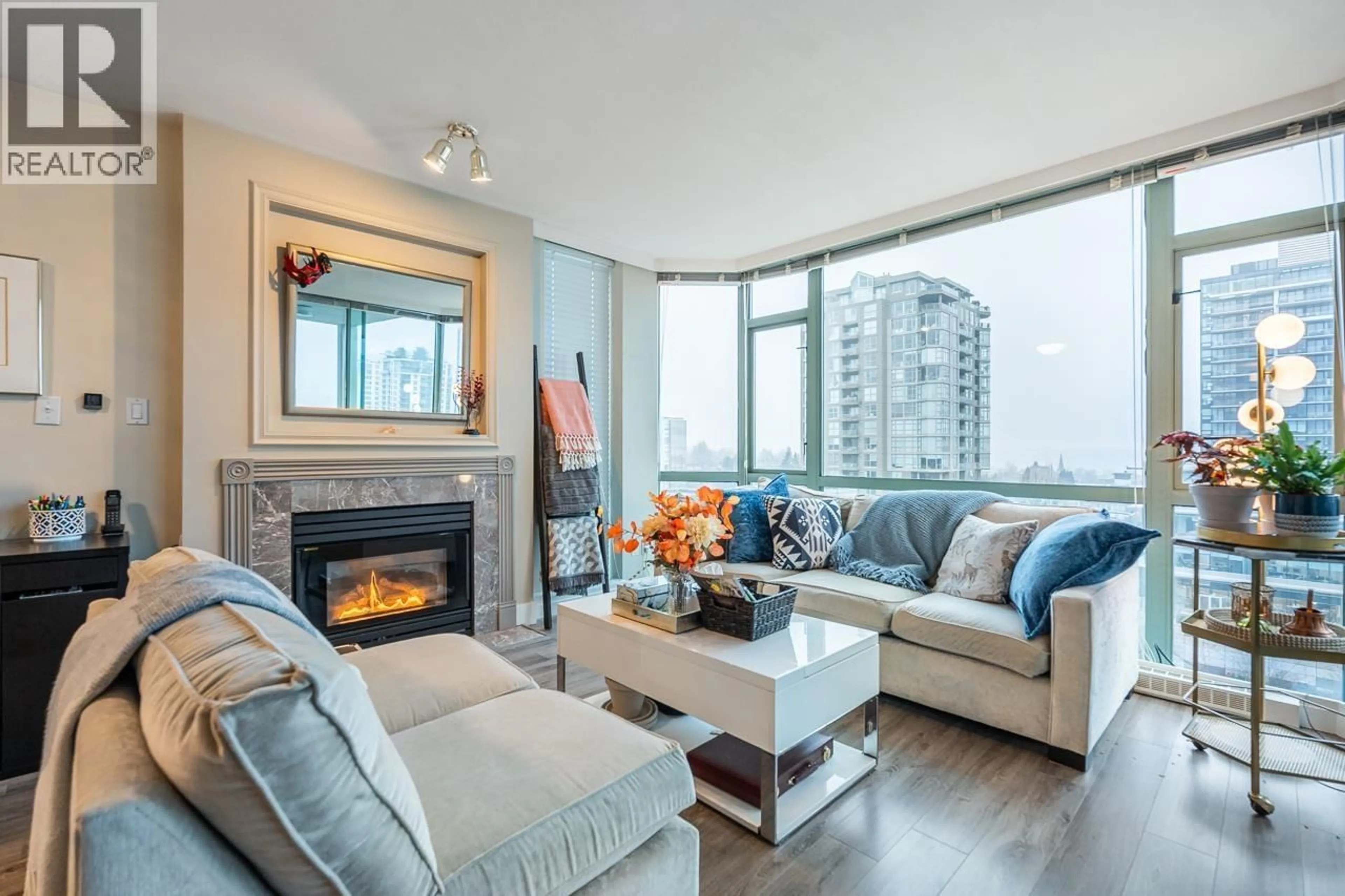 Living room with furniture, wood/laminate floor for 903 - 140 14TH STREET, North Vancouver British Columbia V7L2N3