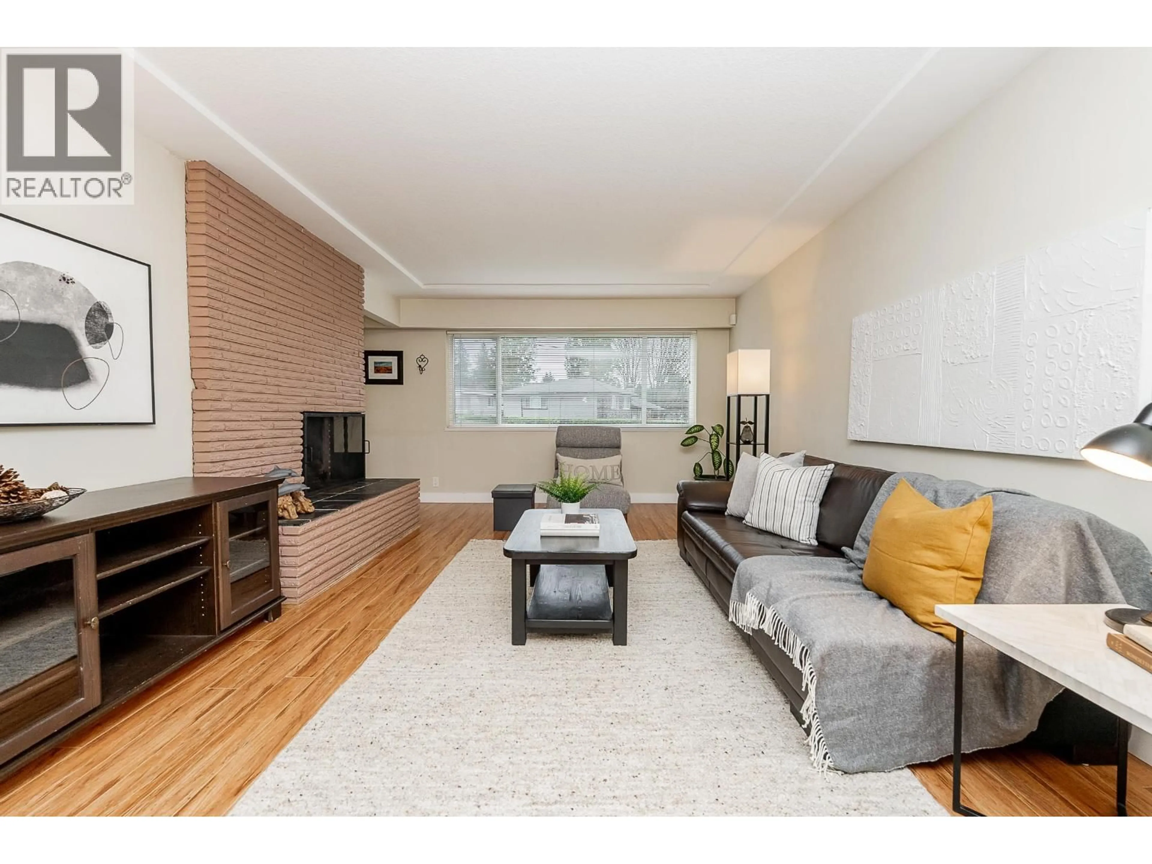 Living room with furniture, wood/laminate floor for 1771 RIDEAU AVENUE, Coquitlam British Columbia V3J3G9