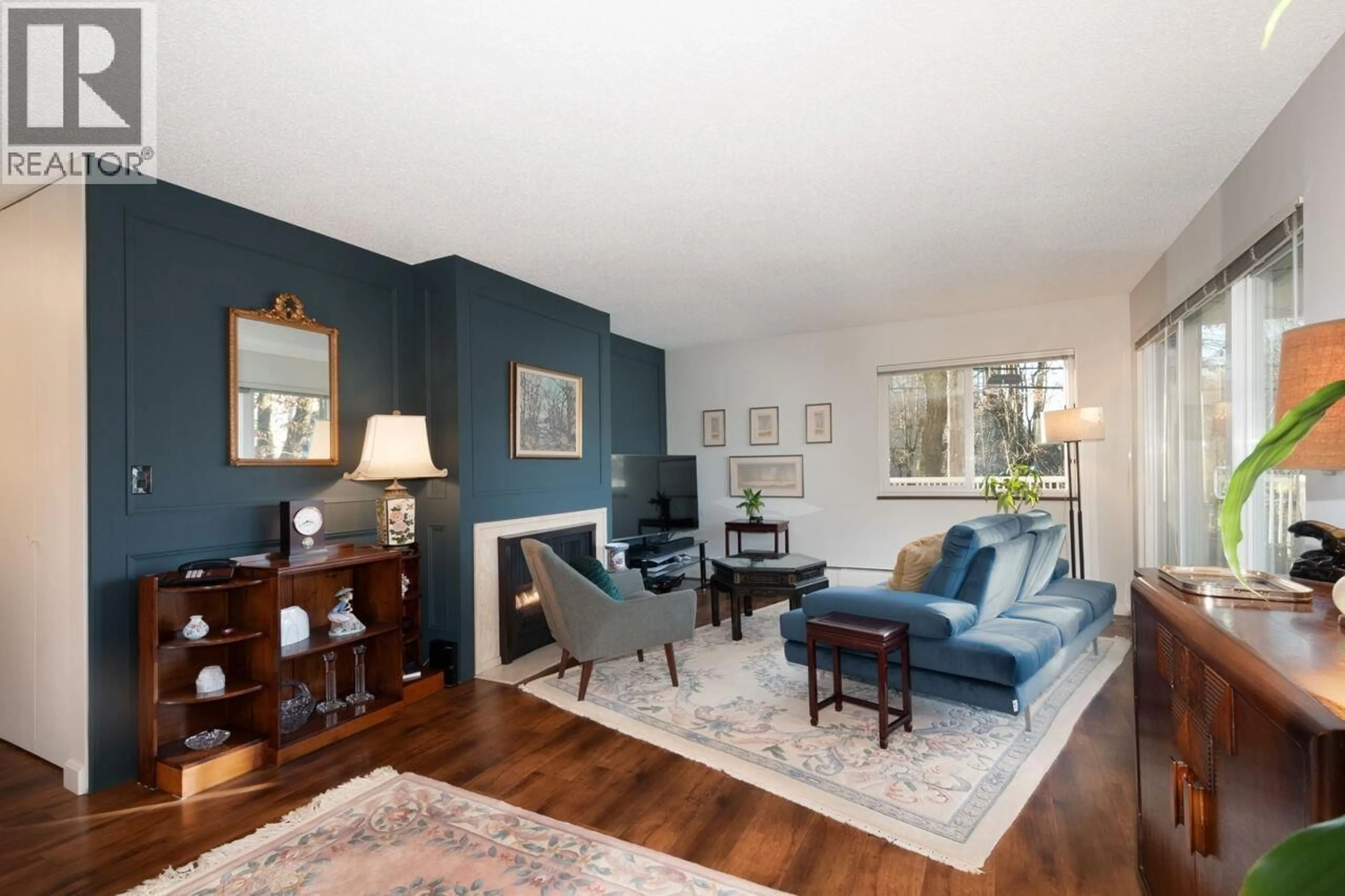 Living room with furniture, wood/laminate floor for 203 - 1696 10TH AVENUE, Vancouver British Columbia V6J2A1