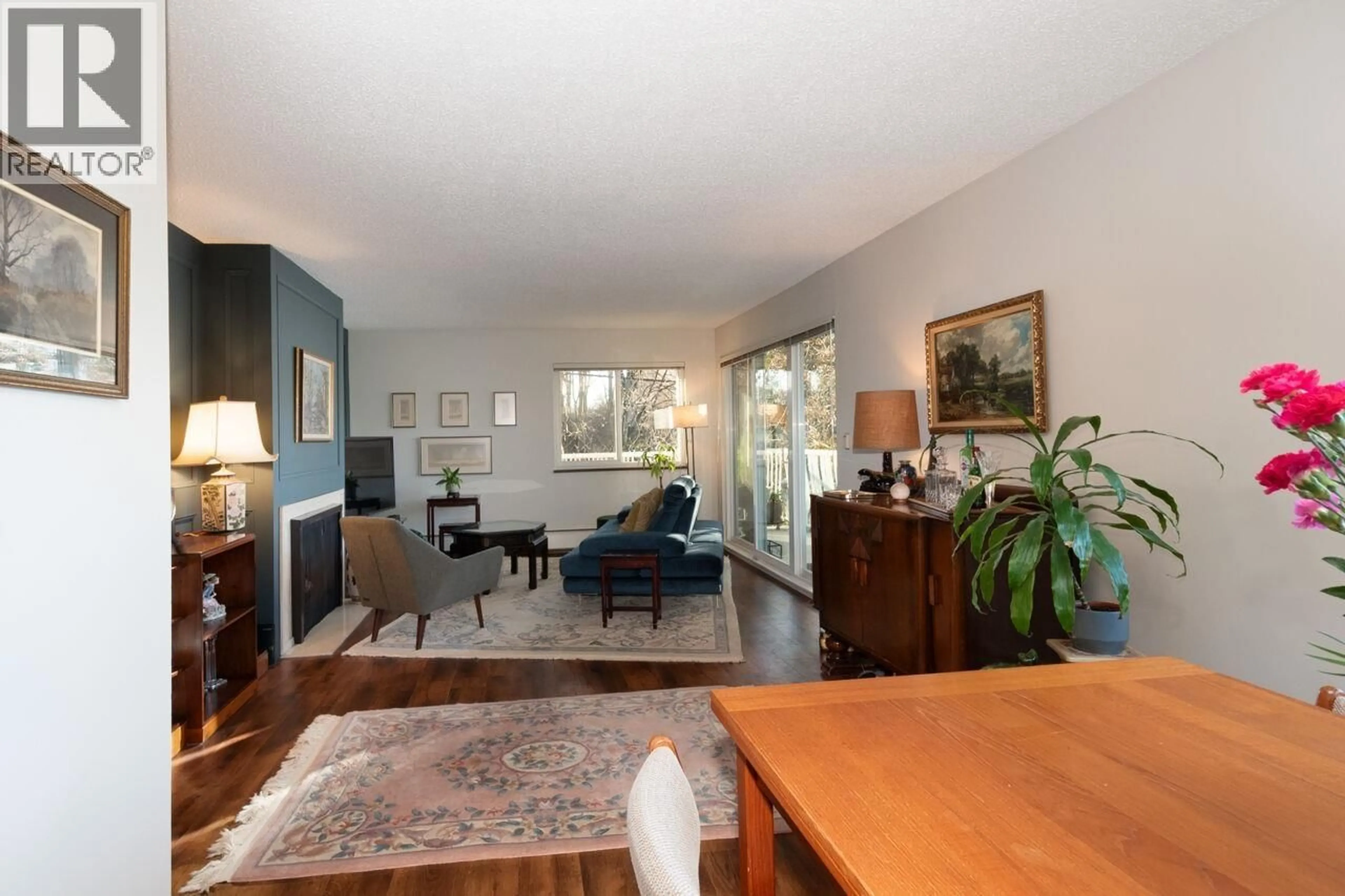 Living room with furniture, wood/laminate floor for 203 - 1696 10TH AVENUE, Vancouver British Columbia V6J2A1