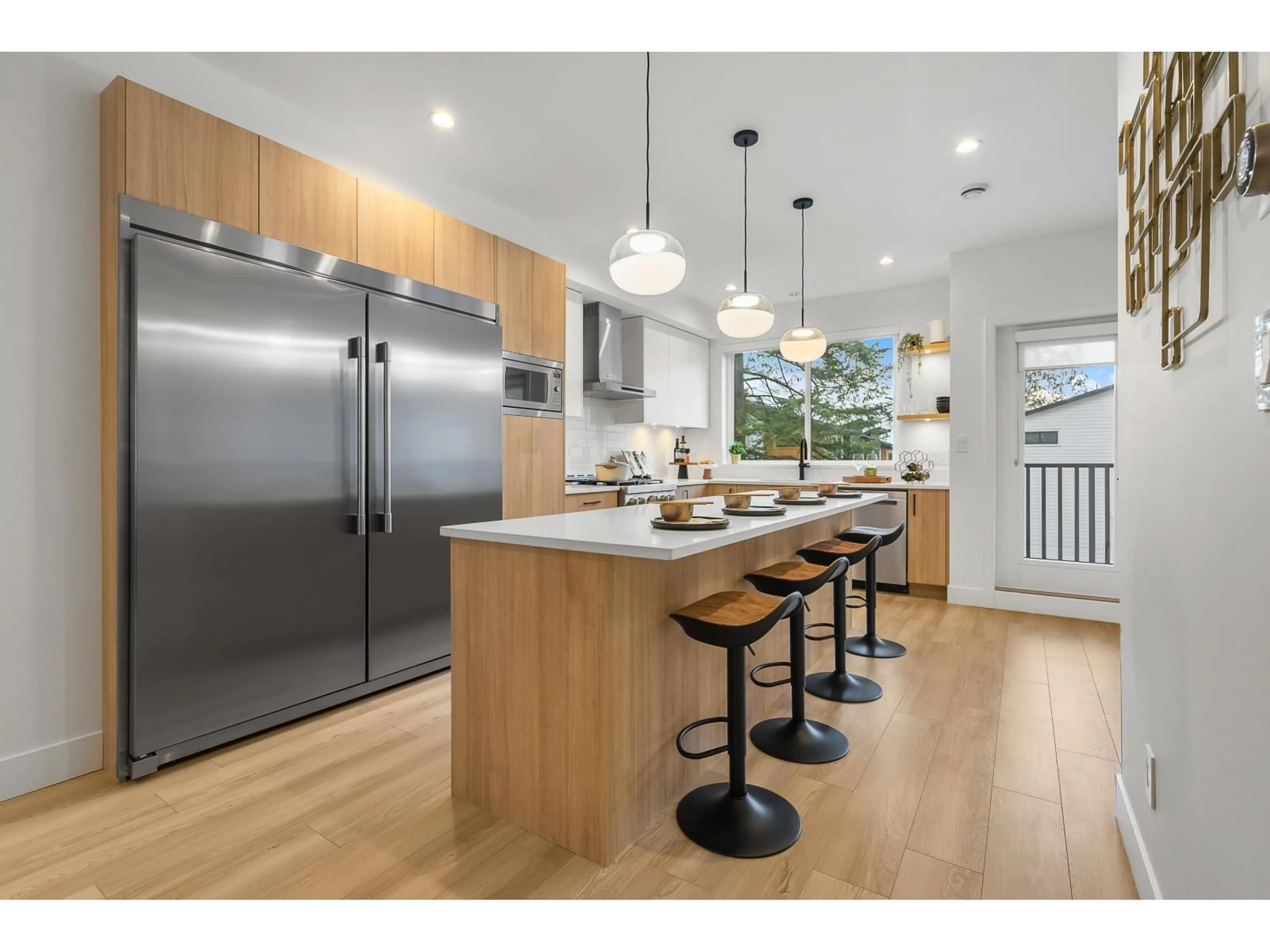 Open concept kitchen, wood/laminate floor for 24 - 17538 100 AVENUE, Surrey British Columbia V4N6X3