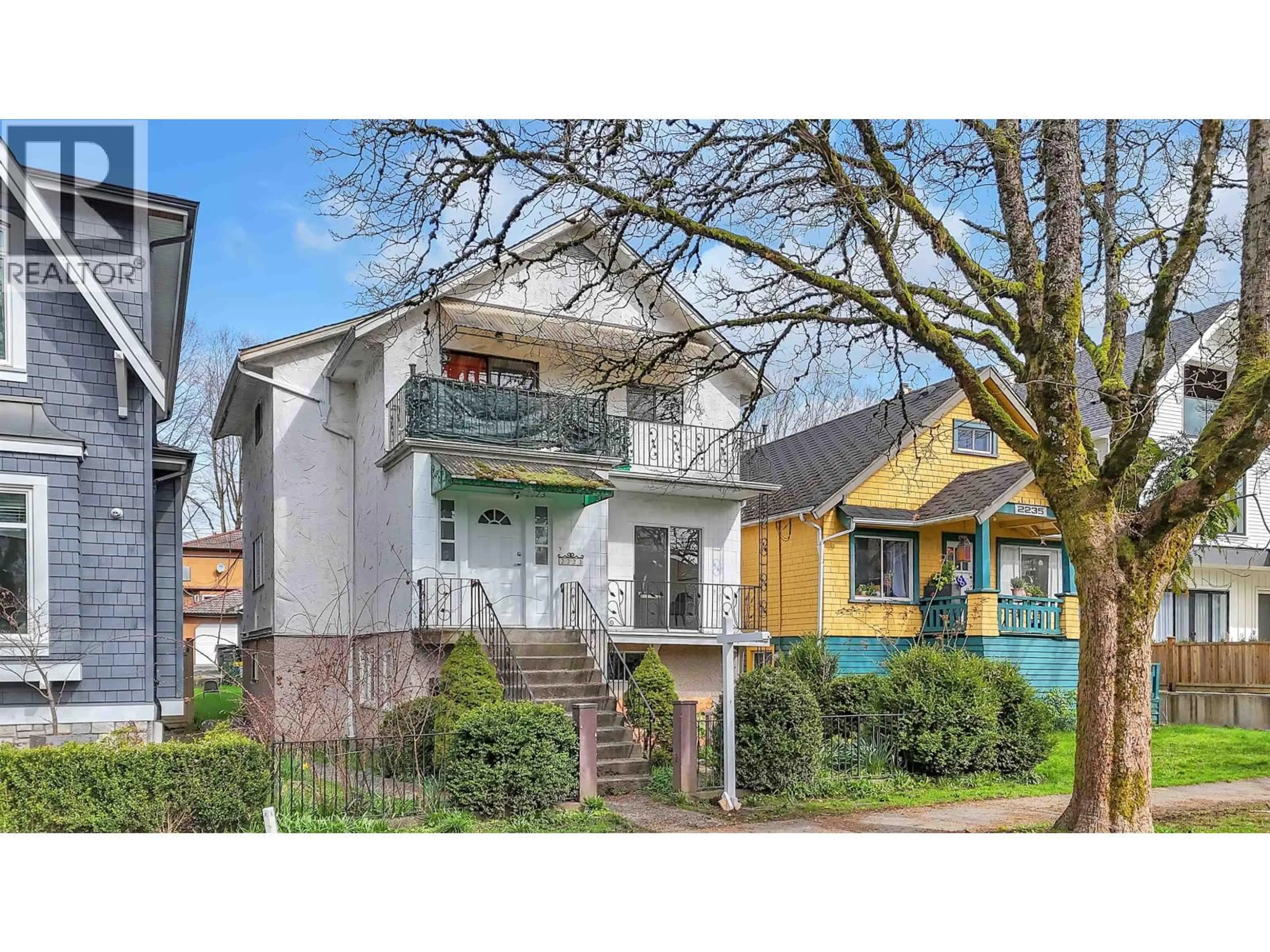 Home with vinyl exterior material, street for 2223 8TH AVENUE, Vancouver British Columbia V6B1A8