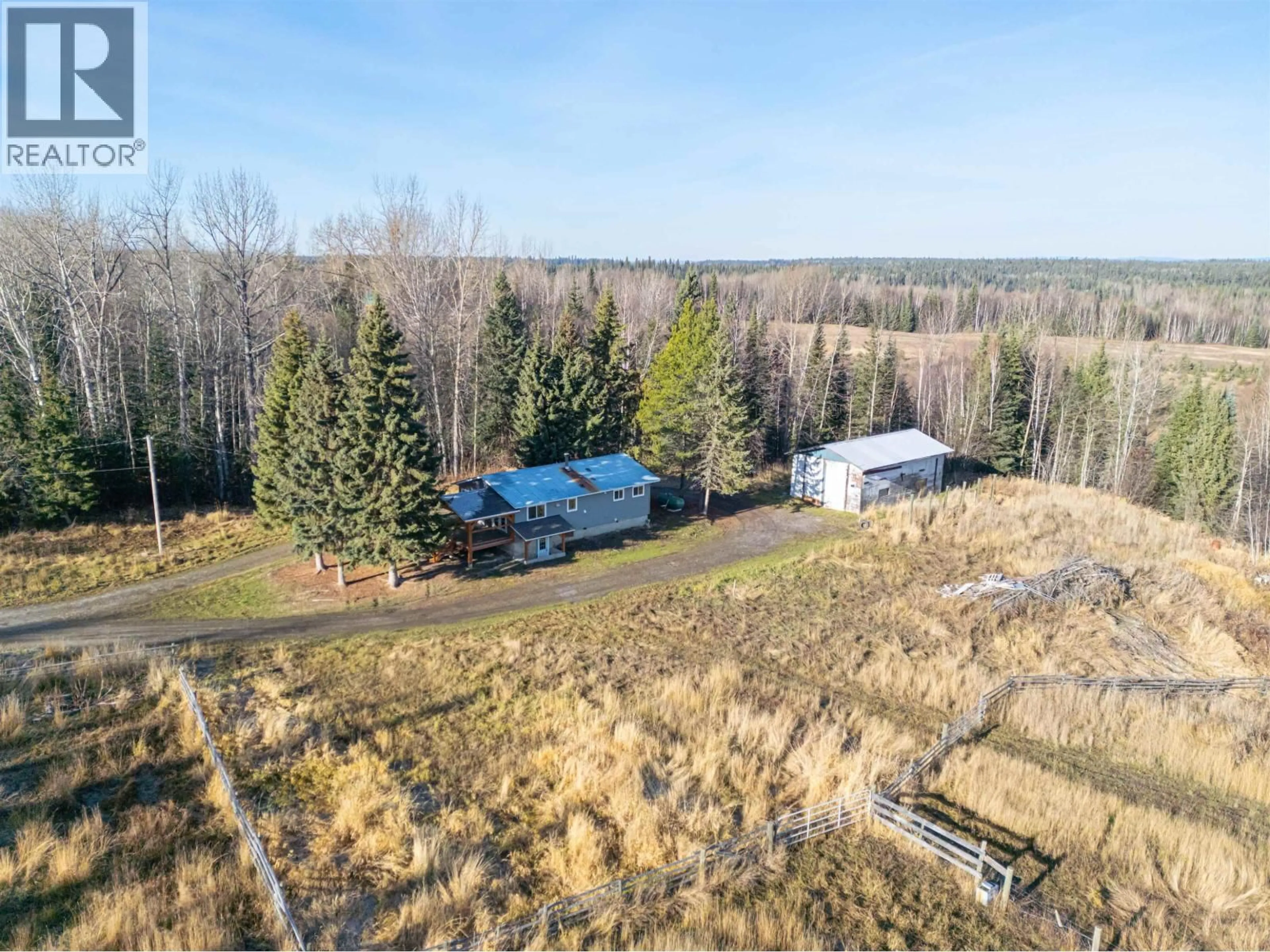 A pic from outside/outdoor area/front of a property/back of a property/a pic from drone, forest/trees view for 16190 O'BRIEN ROAD, Prince George British Columbia V2K5C9