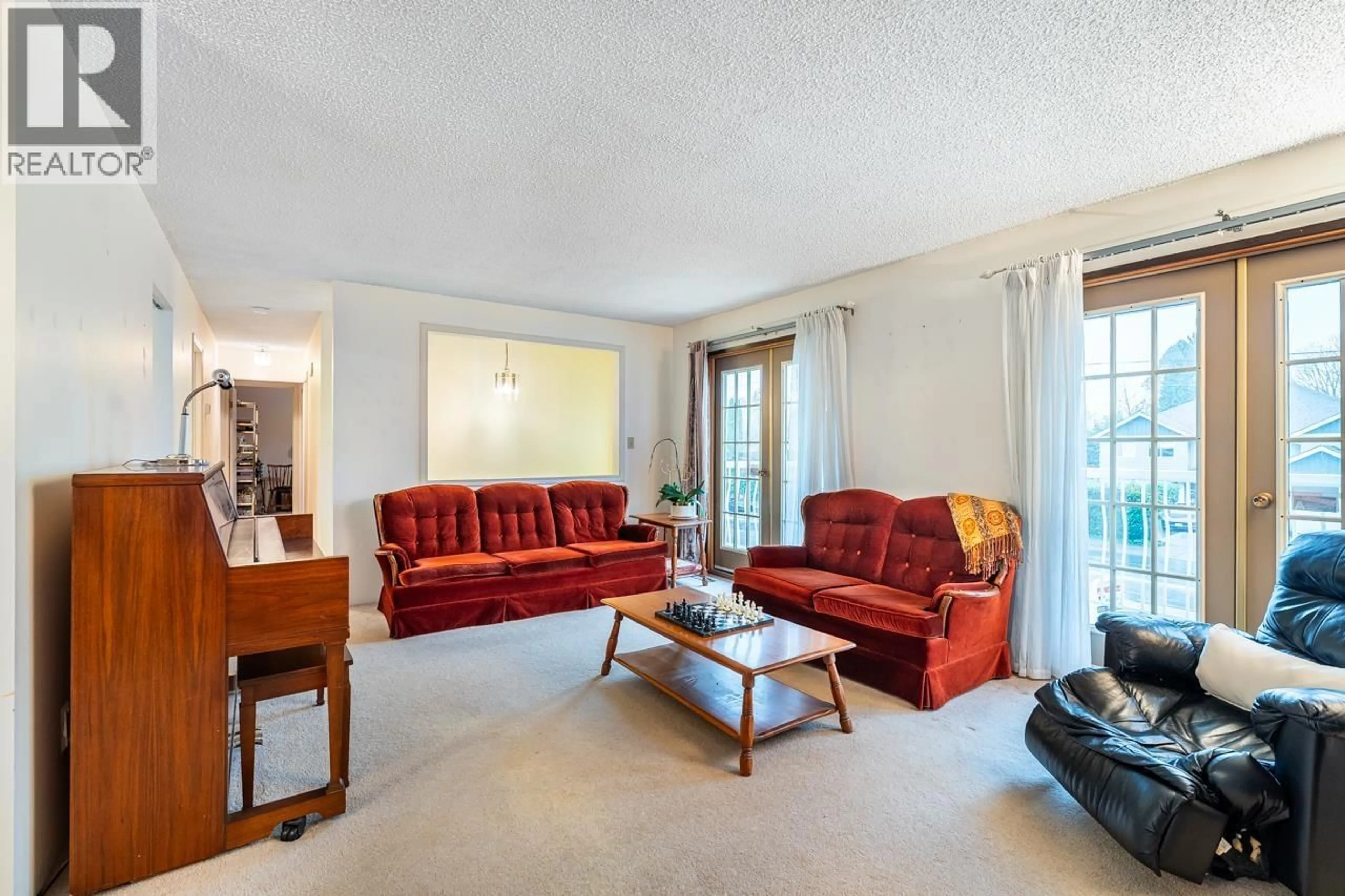 Living room with furniture, unknown for 1632 COMO LAKE AVENUE, Coquitlam British Columbia V3J3P6