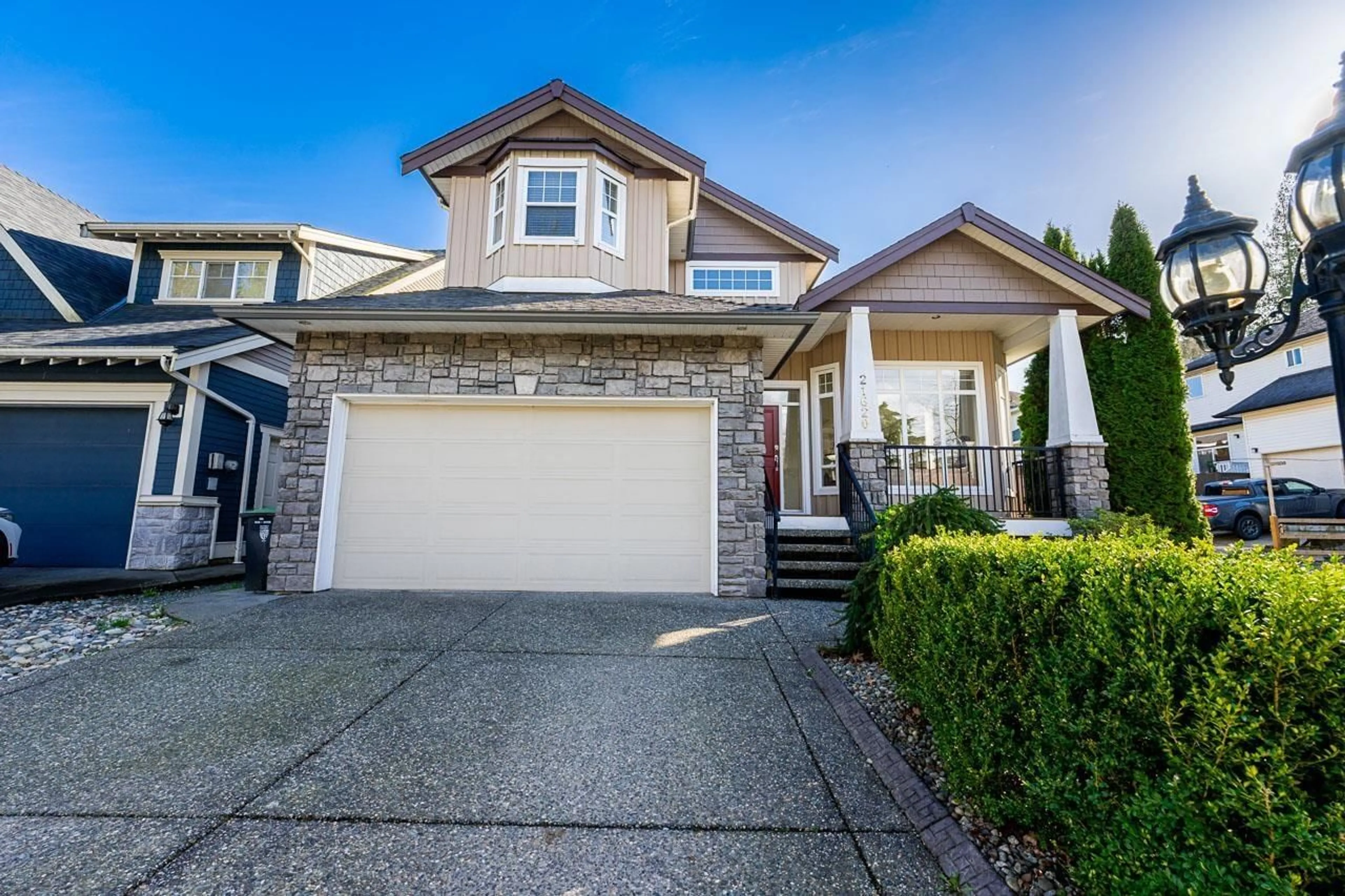 Home with vinyl exterior material, street for 21620 93RD AVENUE, Langley British Columbia V1M4E1