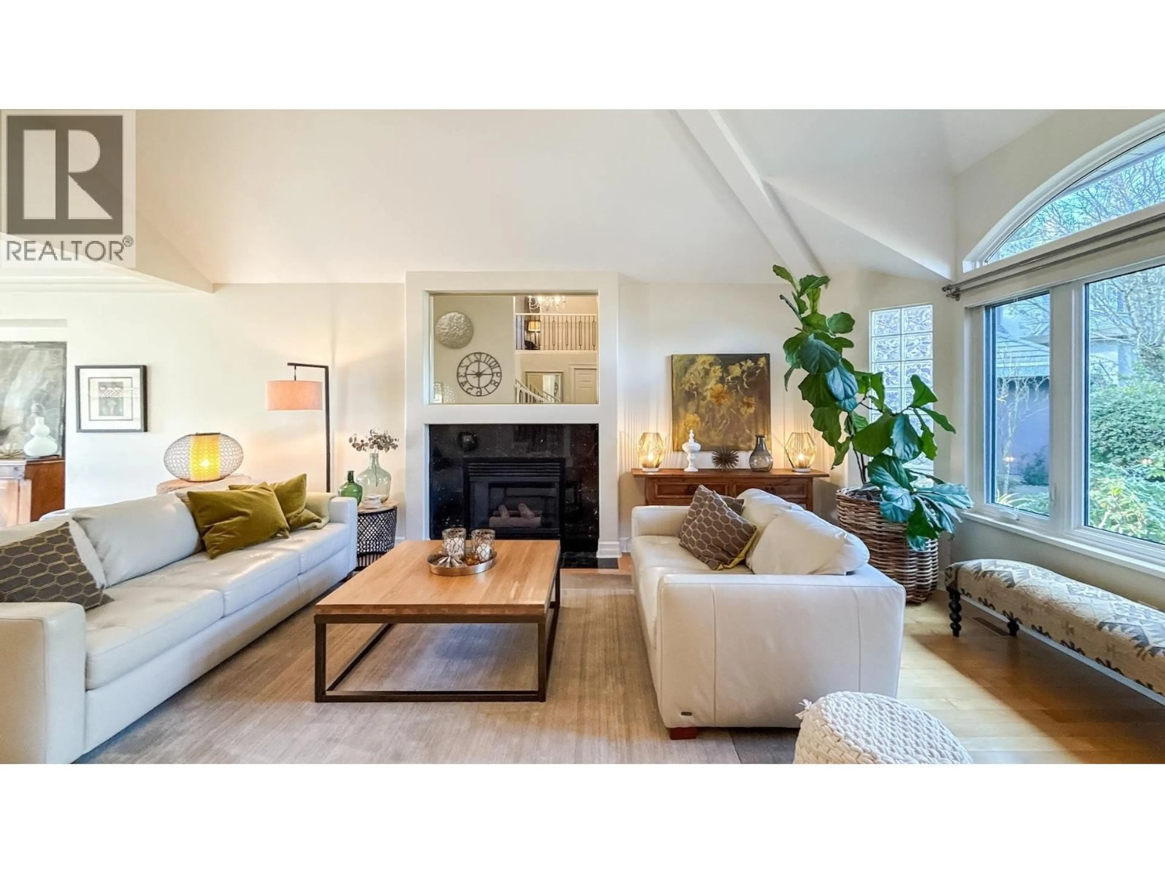 Living room with furniture, wood/laminate floor for 2606 SANDSTONE COURT, Coquitlam British Columbia V3E2T9