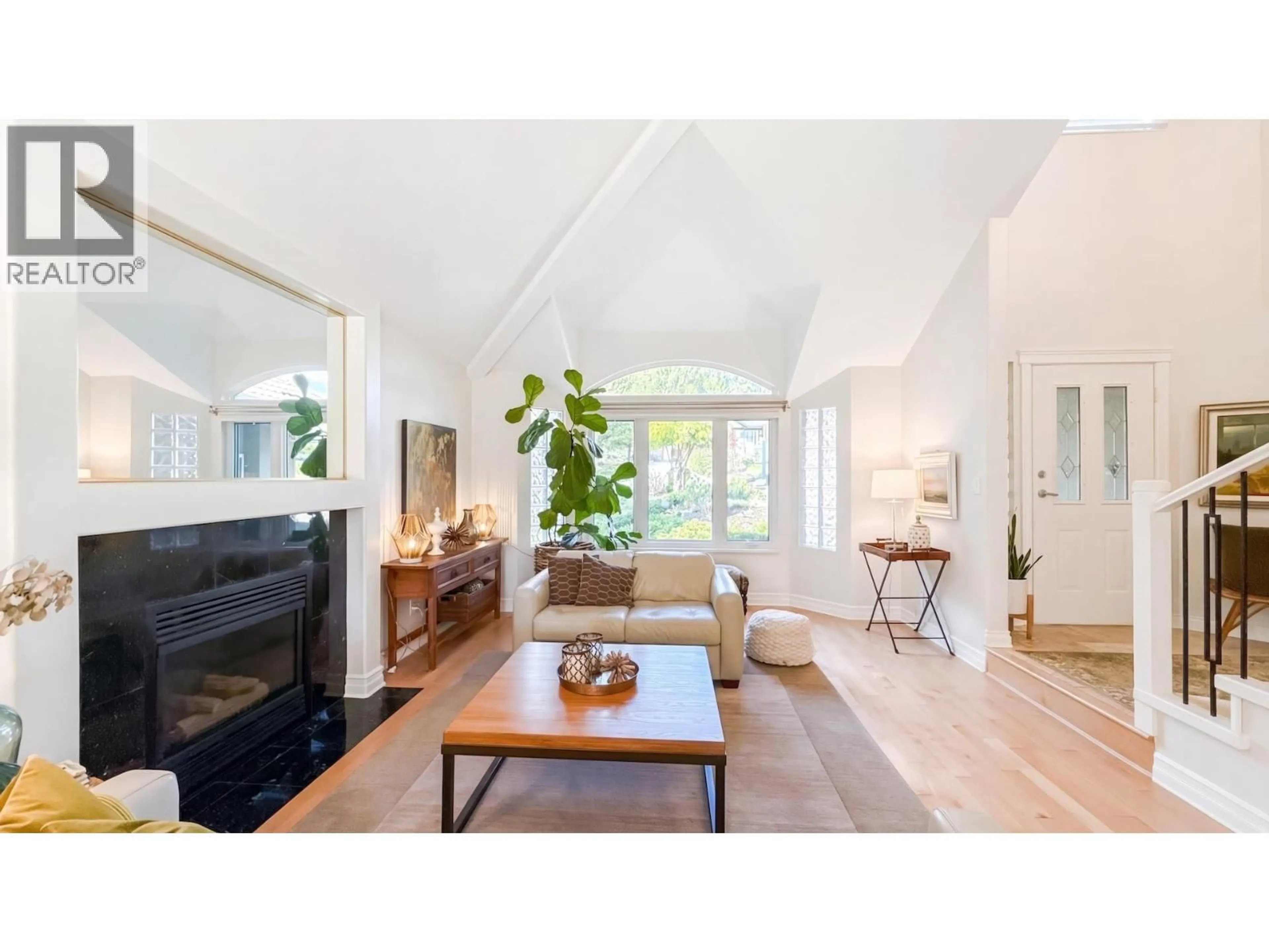 Living room with furniture, wood/laminate floor for 2606 SANDSTONE COURT, Coquitlam British Columbia V3E2T9