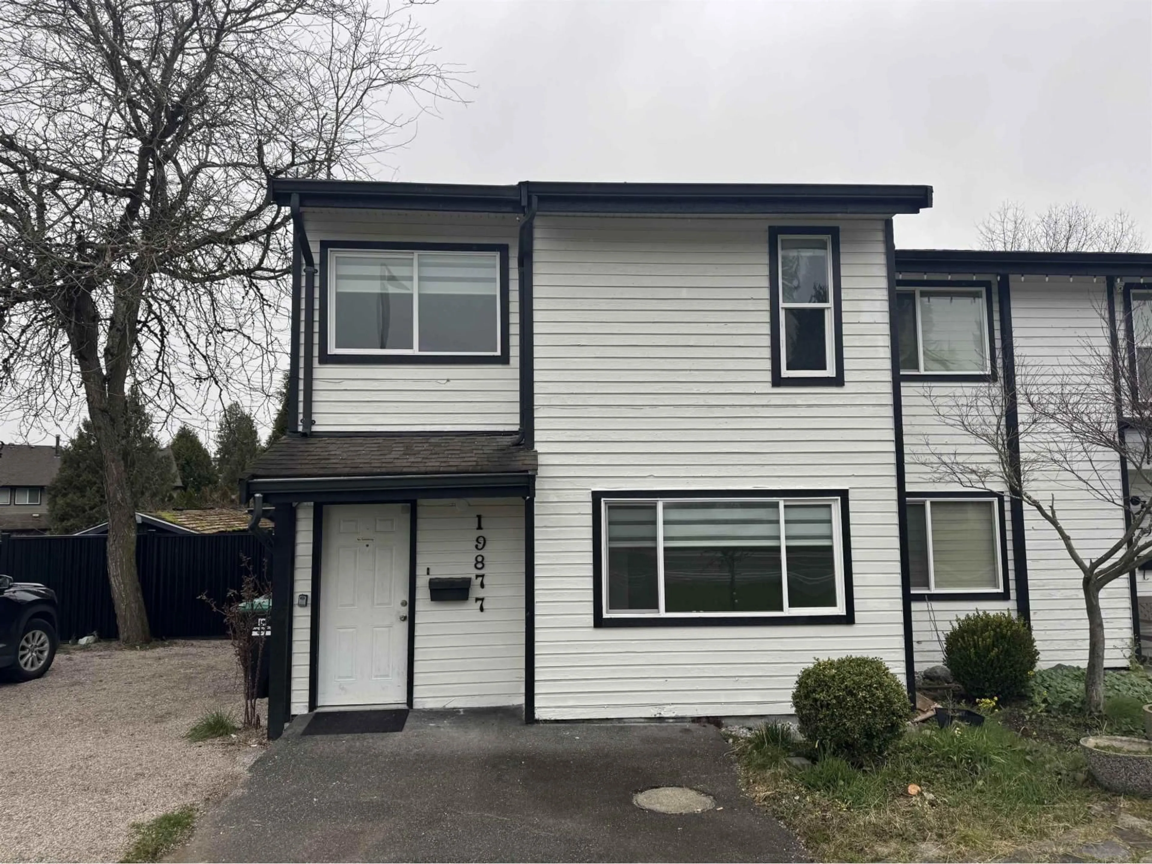 Home with vinyl exterior material, street for 19877 53 AVENUE, Langley British Columbia V3A6W2