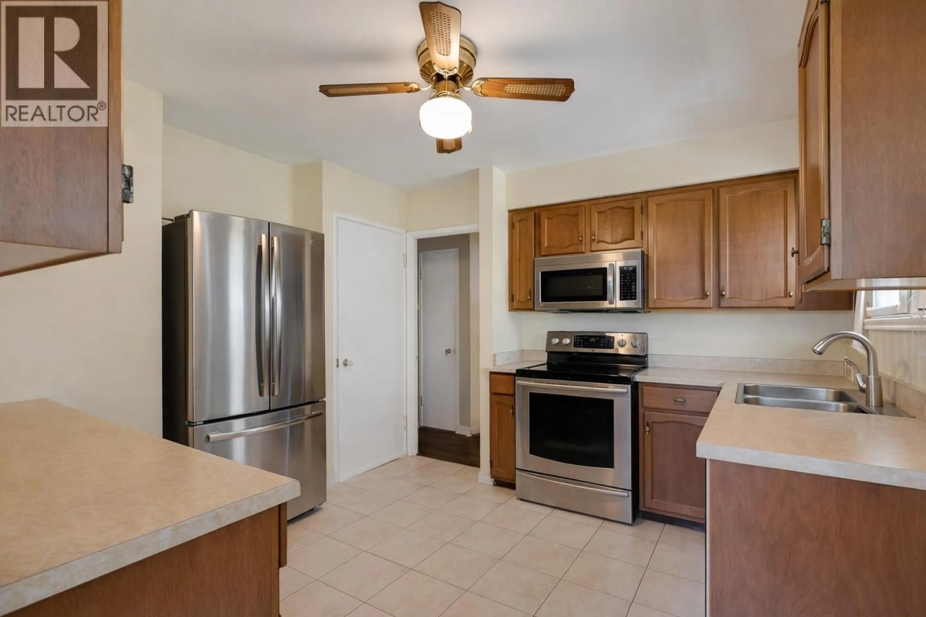 Standard kitchen, ceramic/tile floor for 7016 SIERRA DRIVE, Burnaby British Columbia V5A1A5