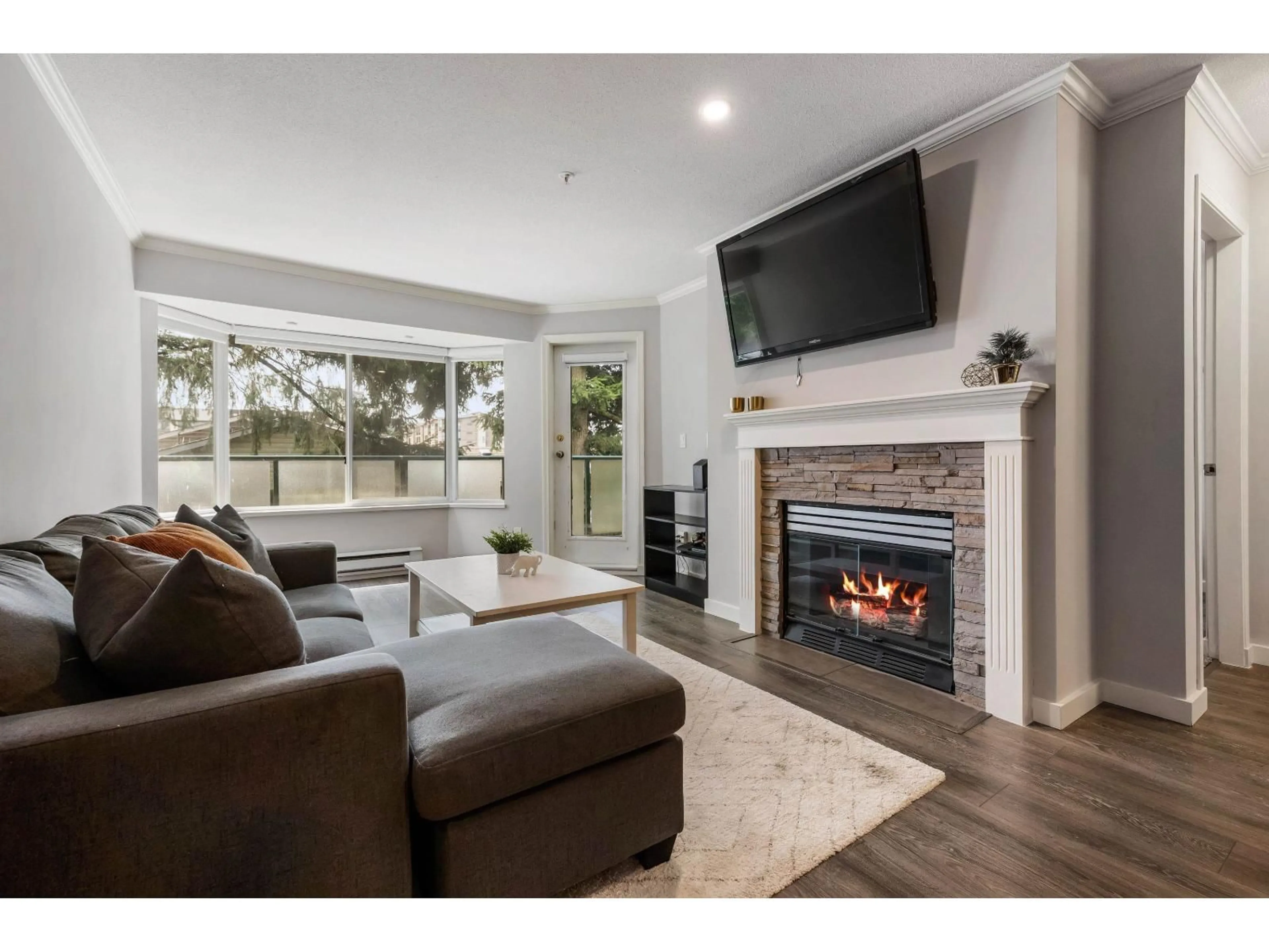 Living room with furniture, unknown for 403 - 2958 TRETHEWEY STREET, Abbotsford British Columbia V2T6P6