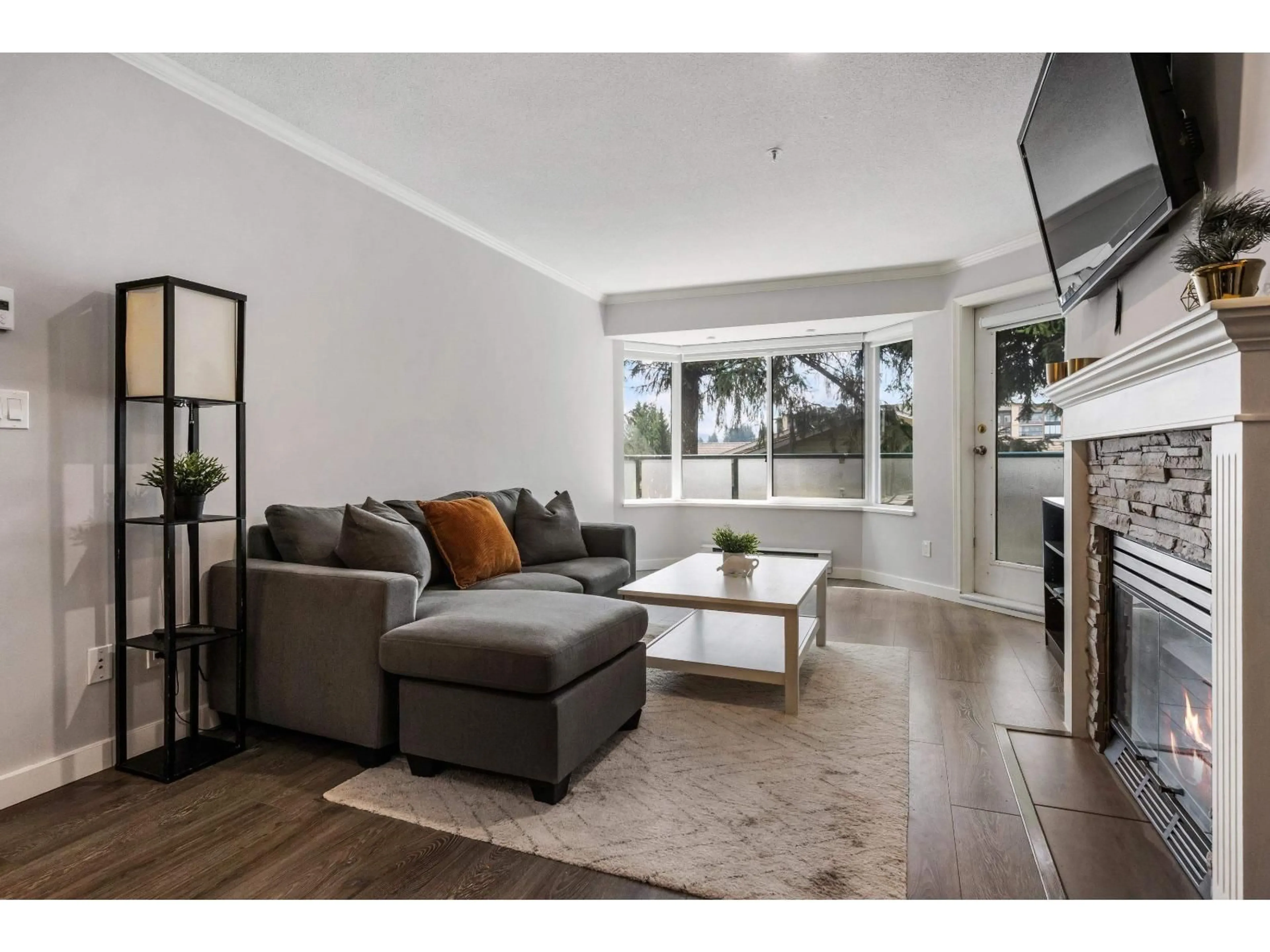 Living room with furniture, unknown for 403 - 2958 TRETHEWEY STREET, Abbotsford British Columbia V2T6P6