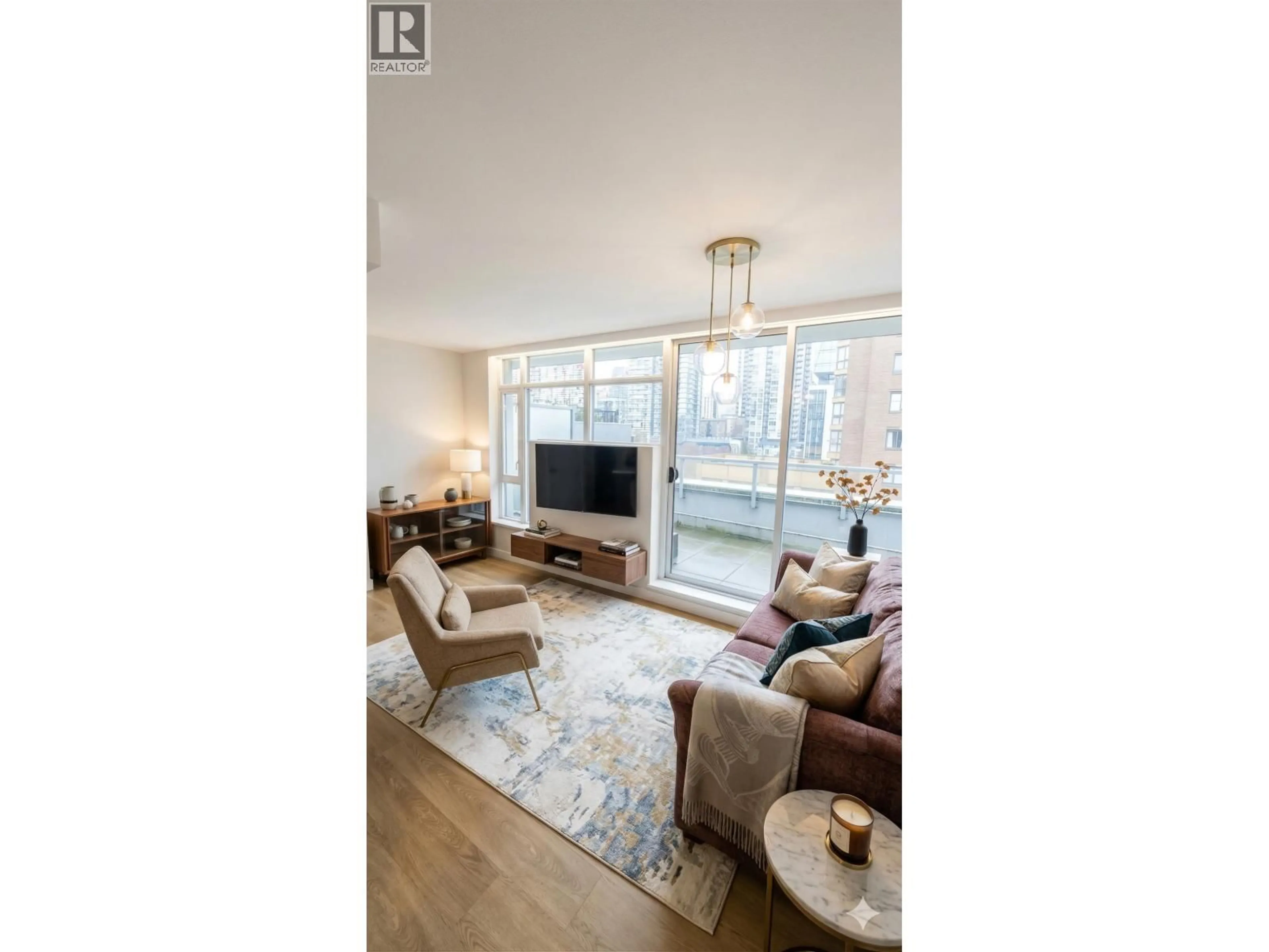 Living room with furniture, wood/laminate floor for 804 - 1133 HOMER STREET, Vancouver British Columbia V6B0B1